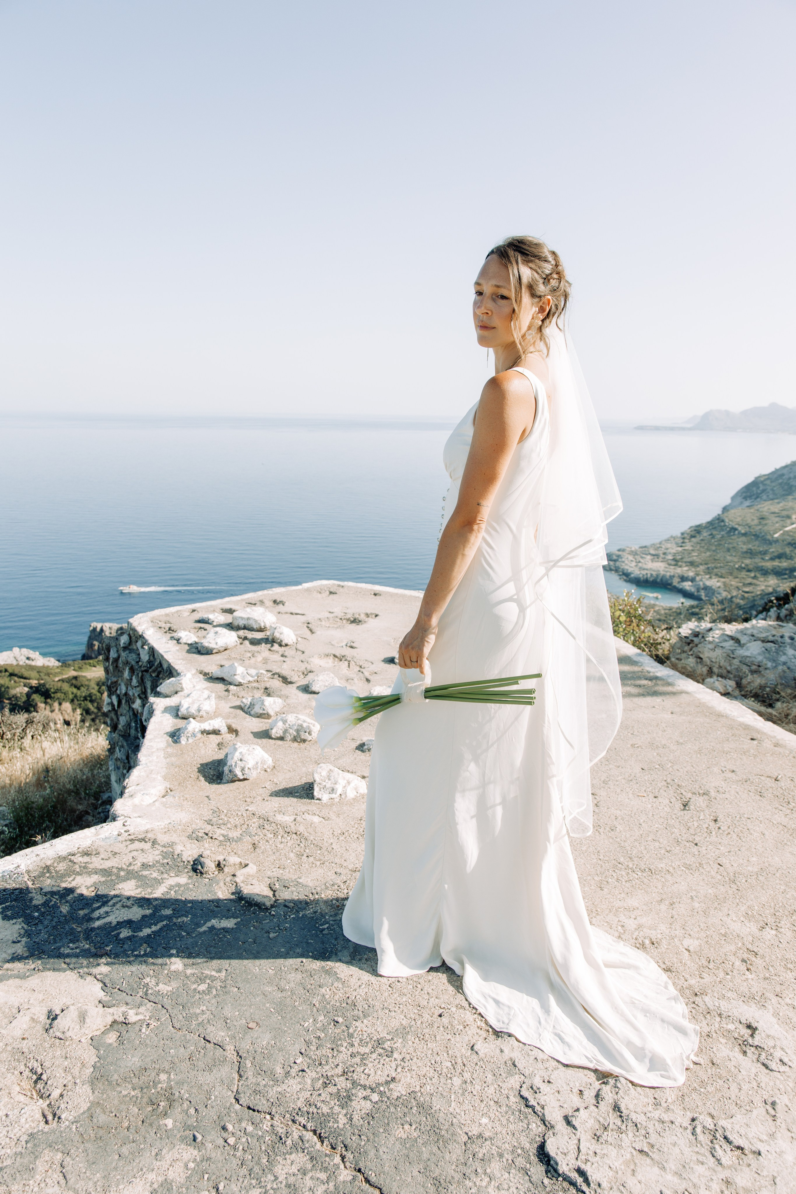 Ring exchange ceremony. Portrait- und Hochzeitsfotografin Irene Art Photo mit Sitz auf der griechischen Insel Rhodos