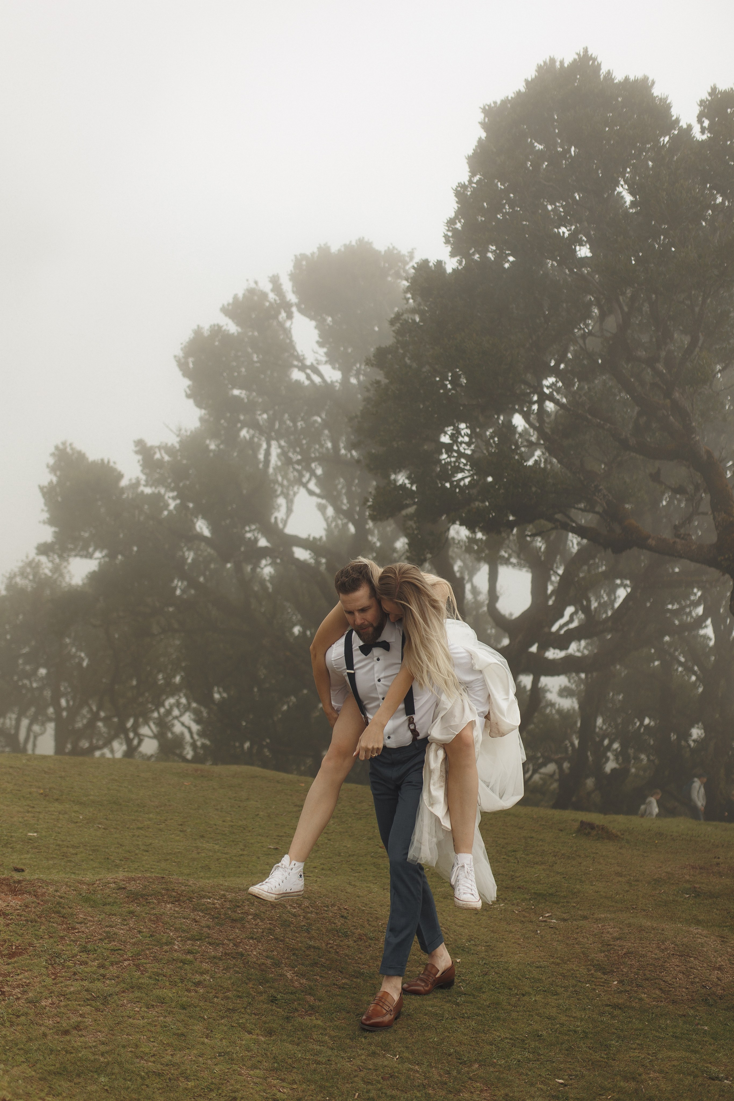 Bride and groom under the trees of Fanal Forest Madeira