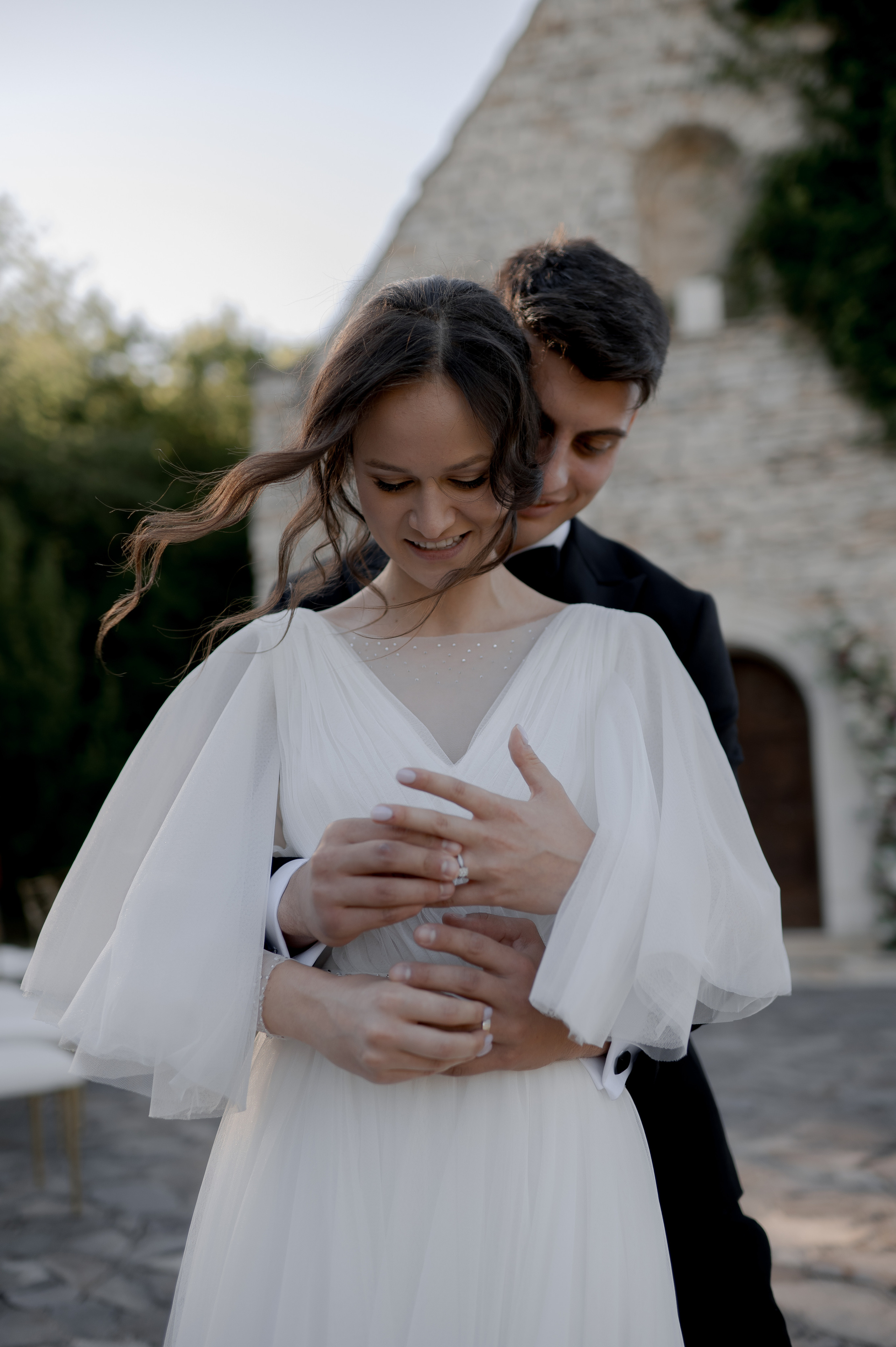 Darius and Denisa tie the knot at SunGarden Resort in July; Denisa stuns in a Romana G Urmanczy dress made in Cluj, complemented by Zahav wedding bands