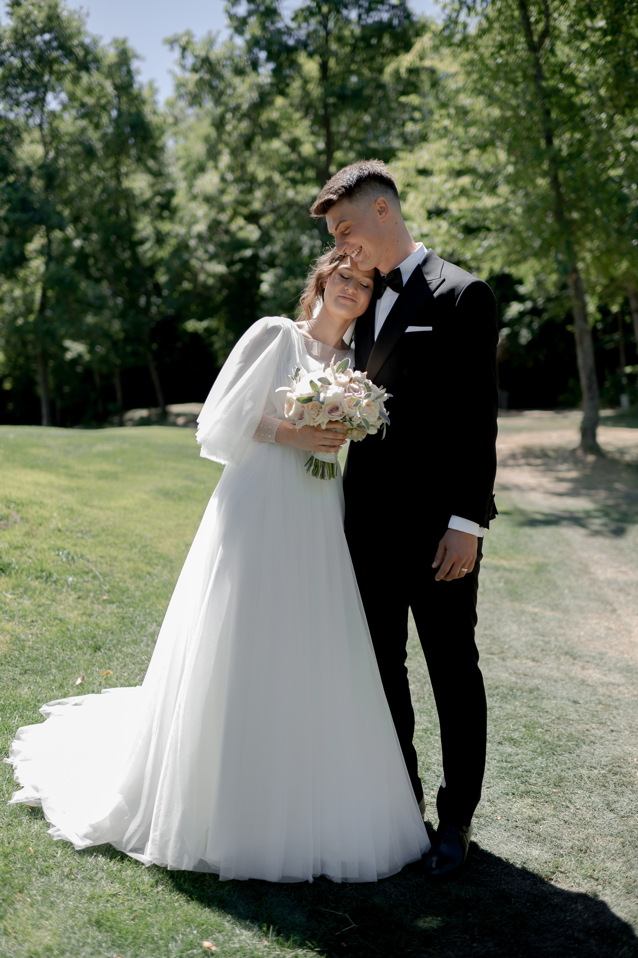 Darius and Denisa celebrate their wedding in July at SunGarden Resort; Denisa in a Romana G Urmanczy dress from Cluj and Zahav wedding bands