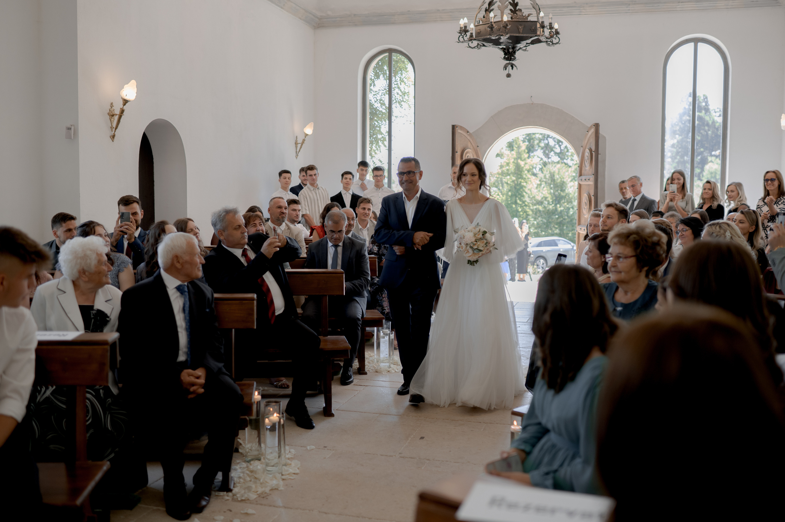 Elegant SunGarden Resort wedding in July with Darius and Denisa; Denisa wearing a Cluj-made Romana G Urmanczy wedding dress and Zahav wedding bands.