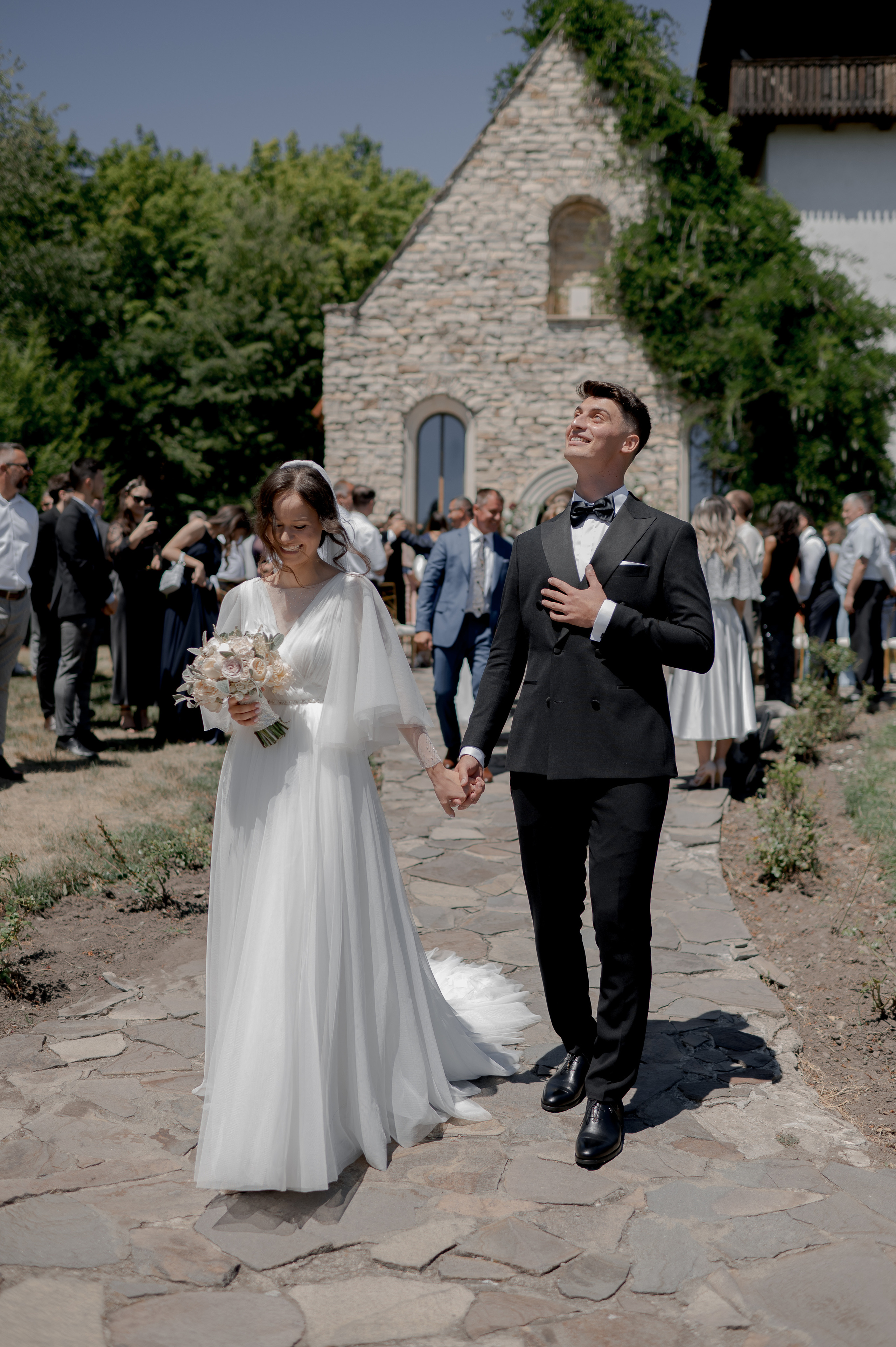 Beautiful summer wedding at SunGarden Resort: Denisa in a stunning Romana G Urmanczy dress made in Cluj, with Zahav wedding bands.