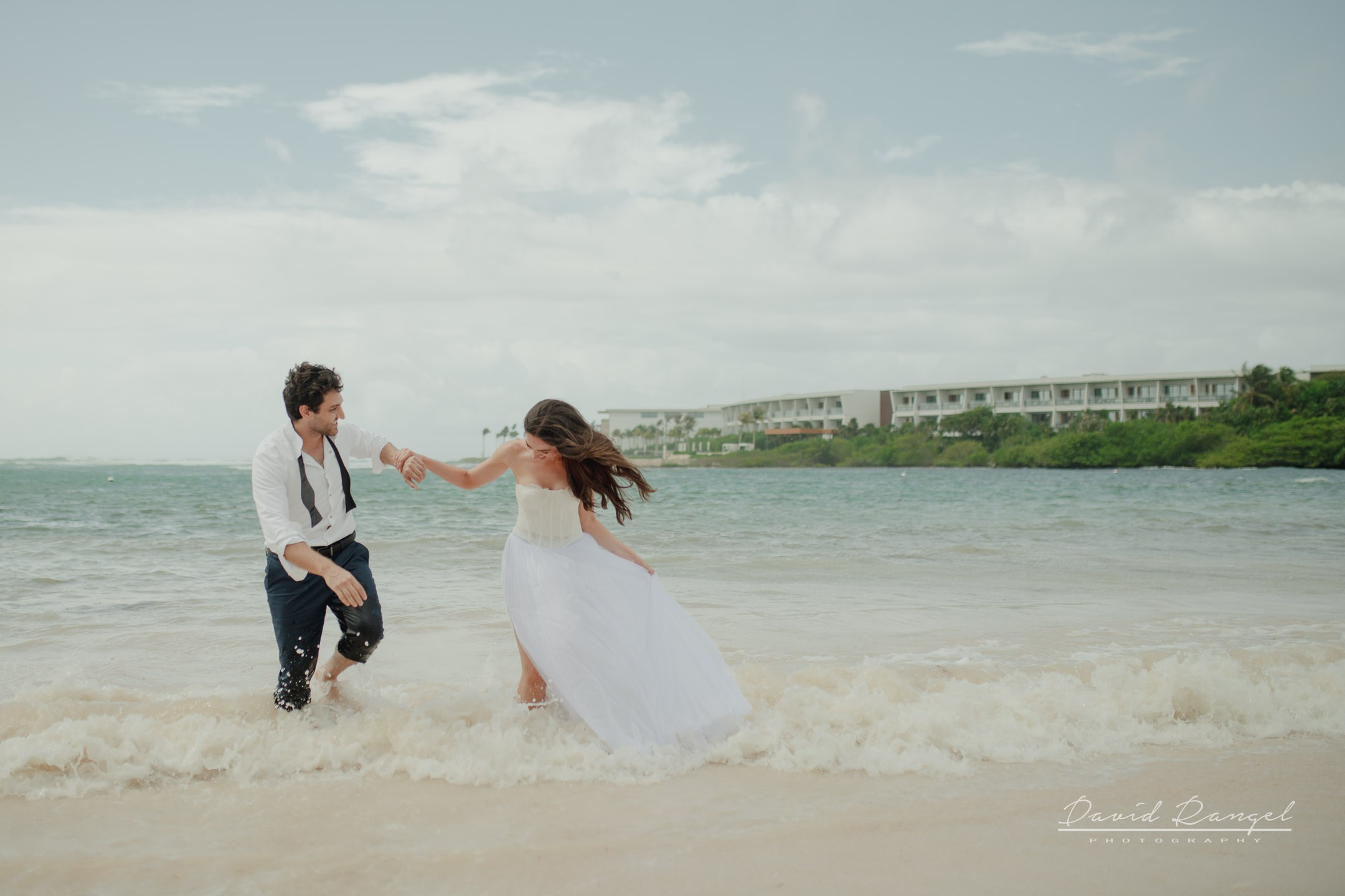 Secilia and Brandon tras the dress at the Conrad Tulum Hotel. Destination wedding photographer based in Cancun and Riviera Maya with service worldwide