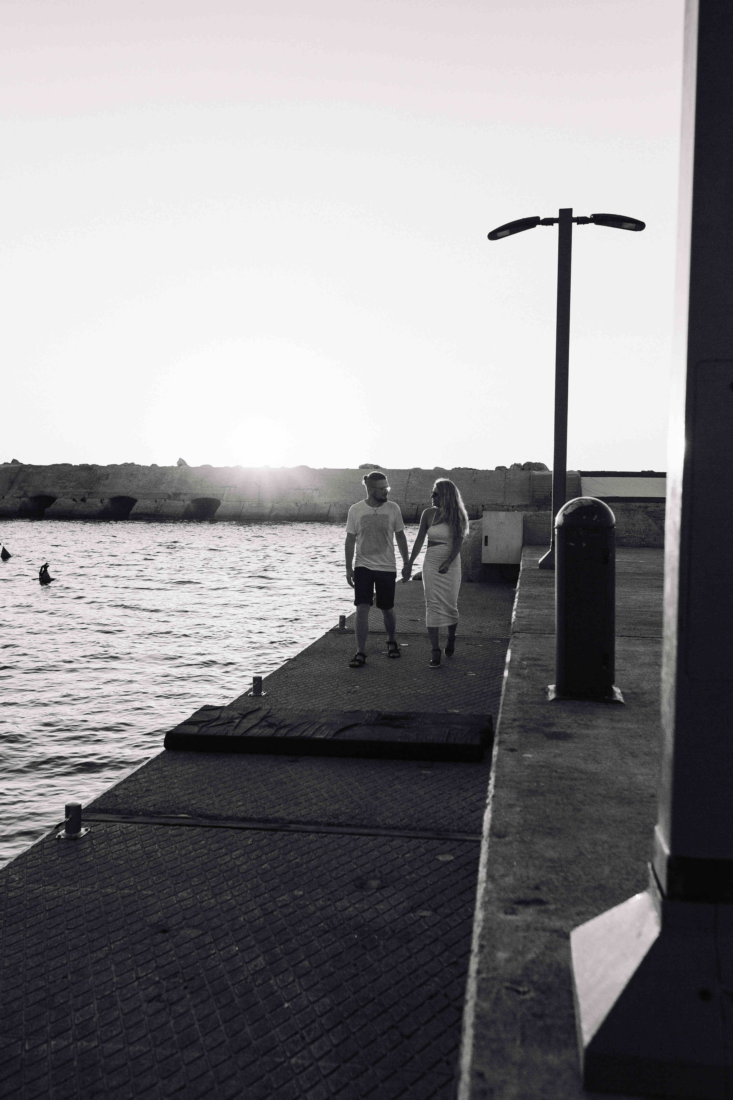 SUNSET IN JAFFO PORT. PHOTOGRAPHER IN ISRAEL