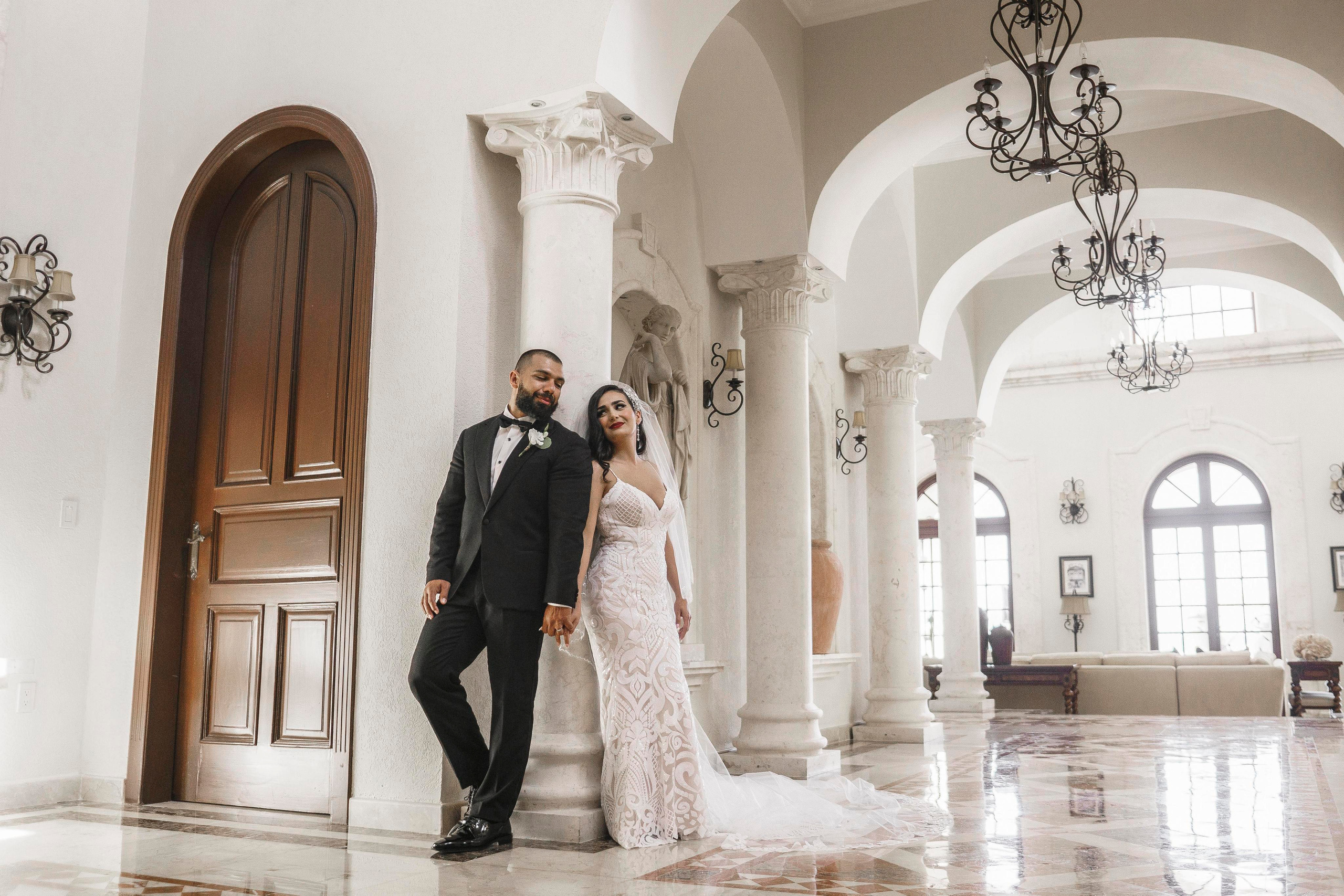 Hacienda wedding shoot with bride and groom in dramatic lighting