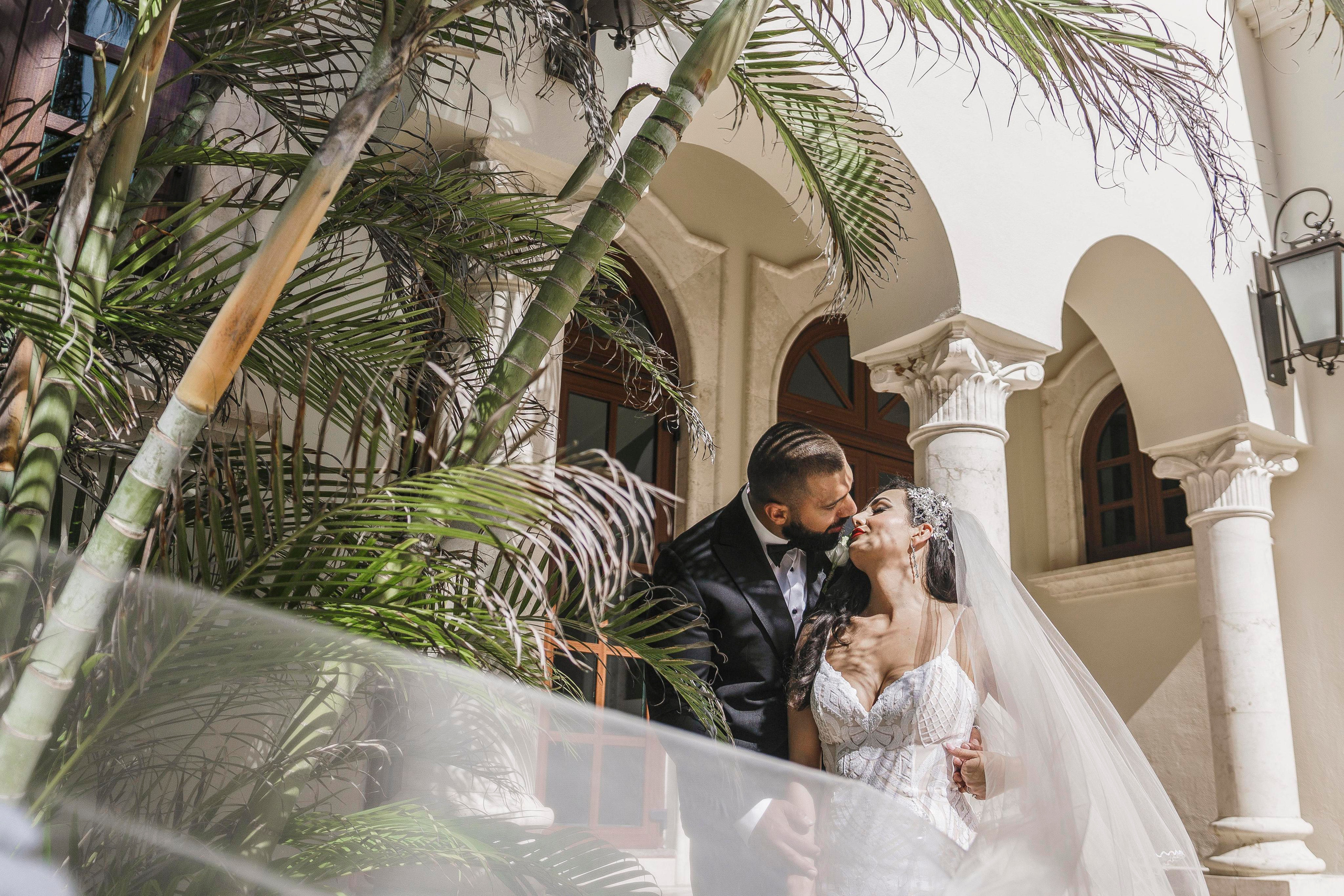 Bride and groom outside historic Mexican hacienda captured professionally