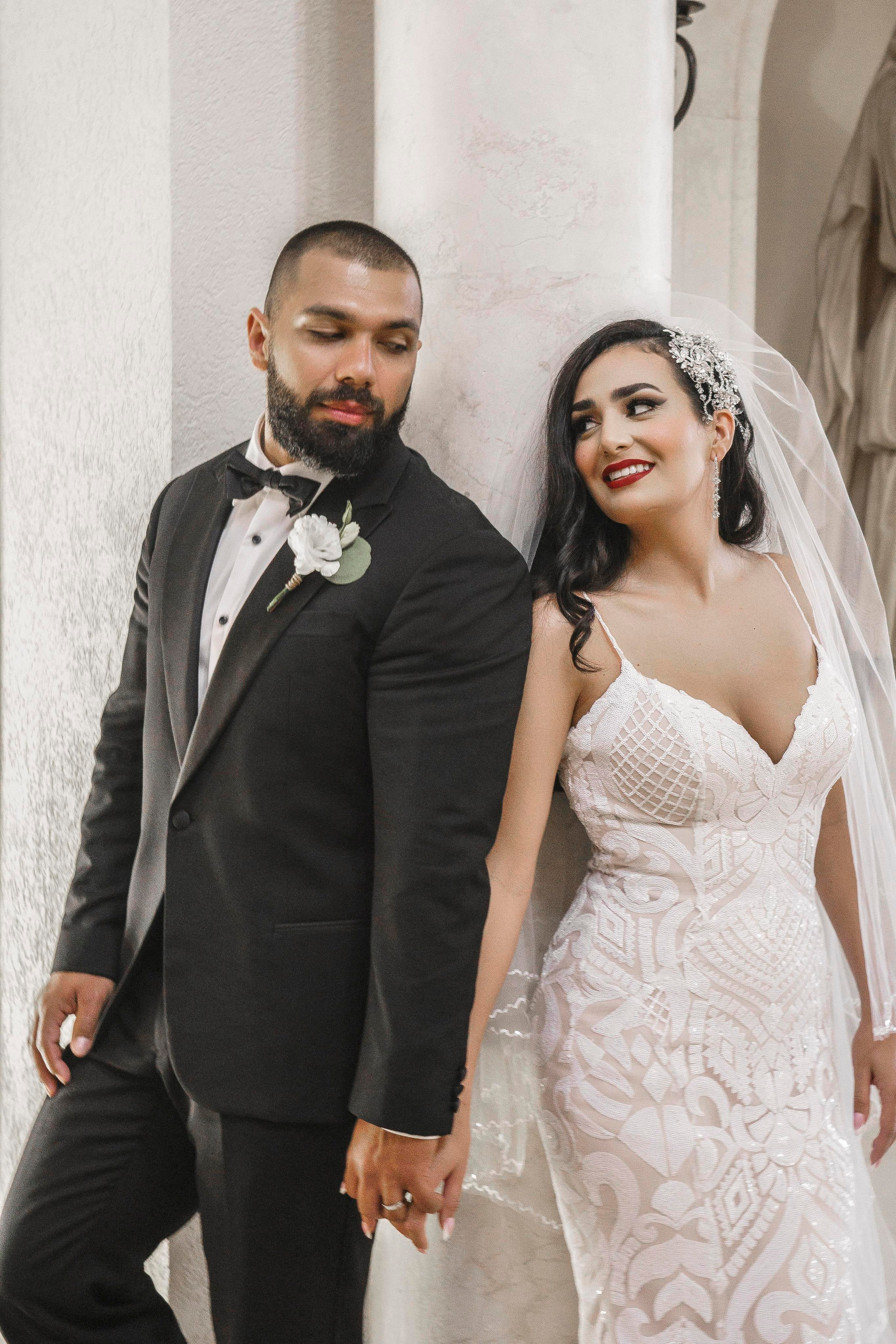 Elegant indoor wedding portrait in timeless Cancun hacienda