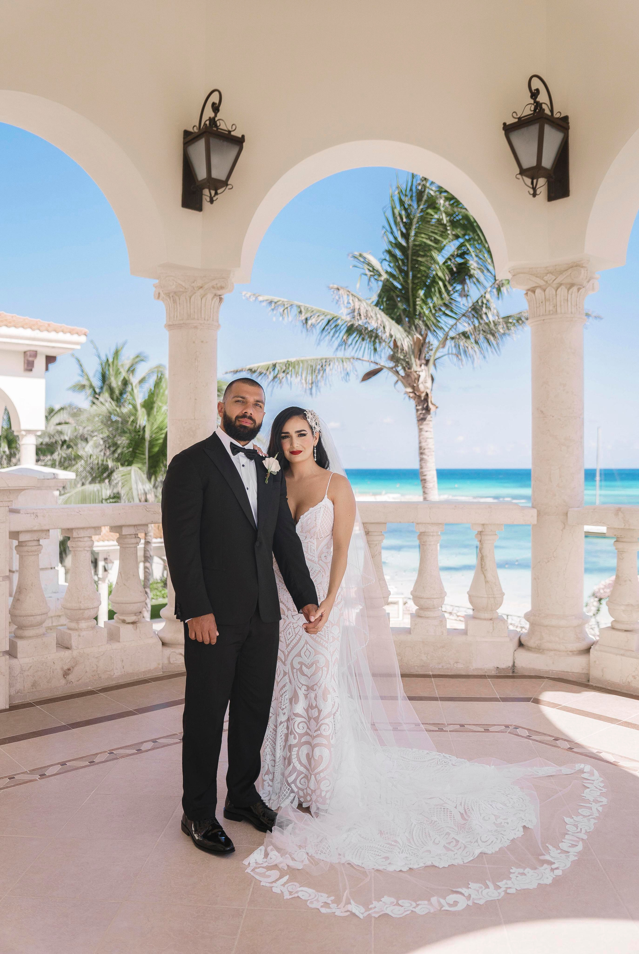 Candid wedding first look moment in Cancun beach resort