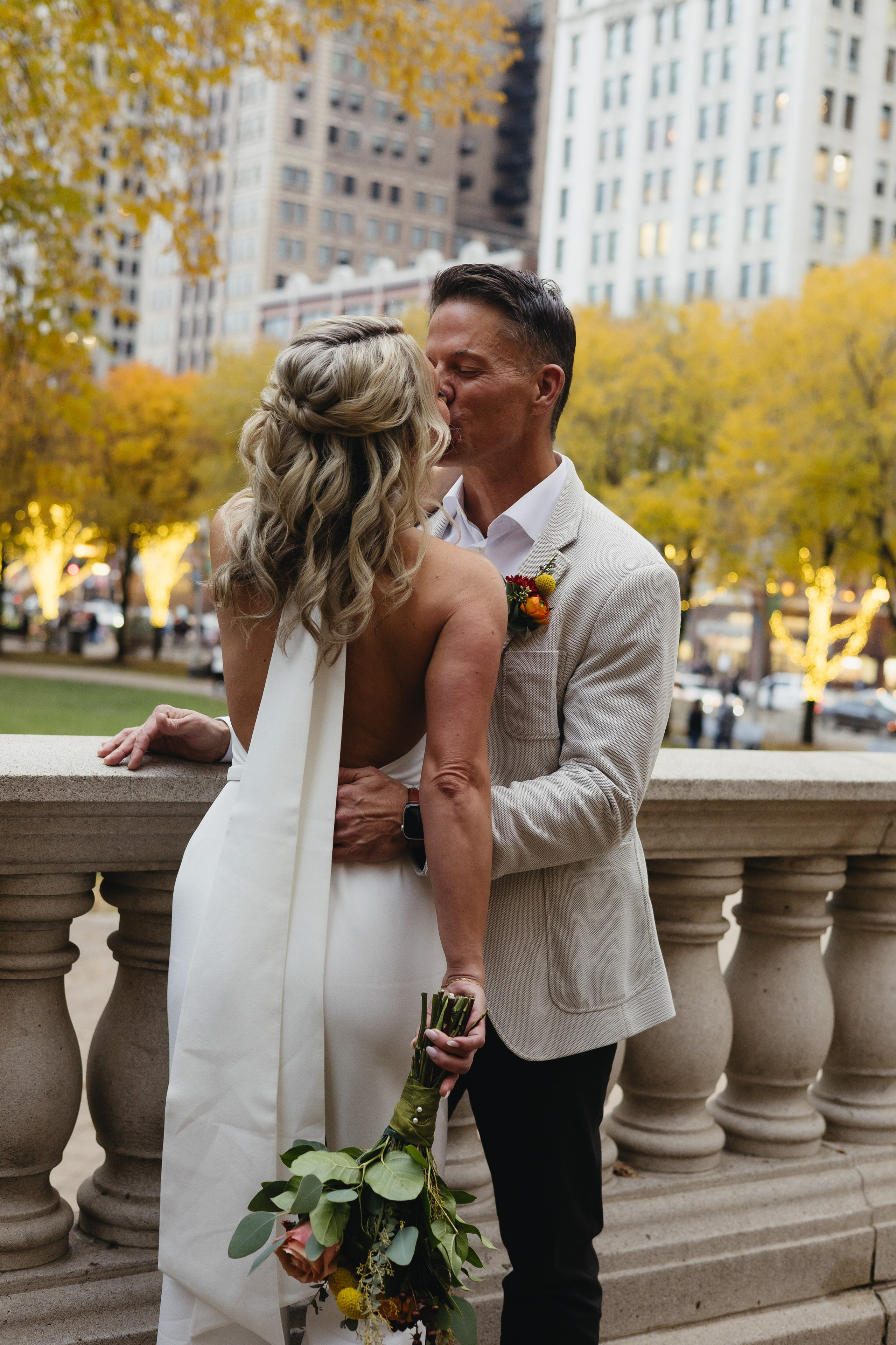 Wedding couple with Chicago skyline view, timeless city wedding photography