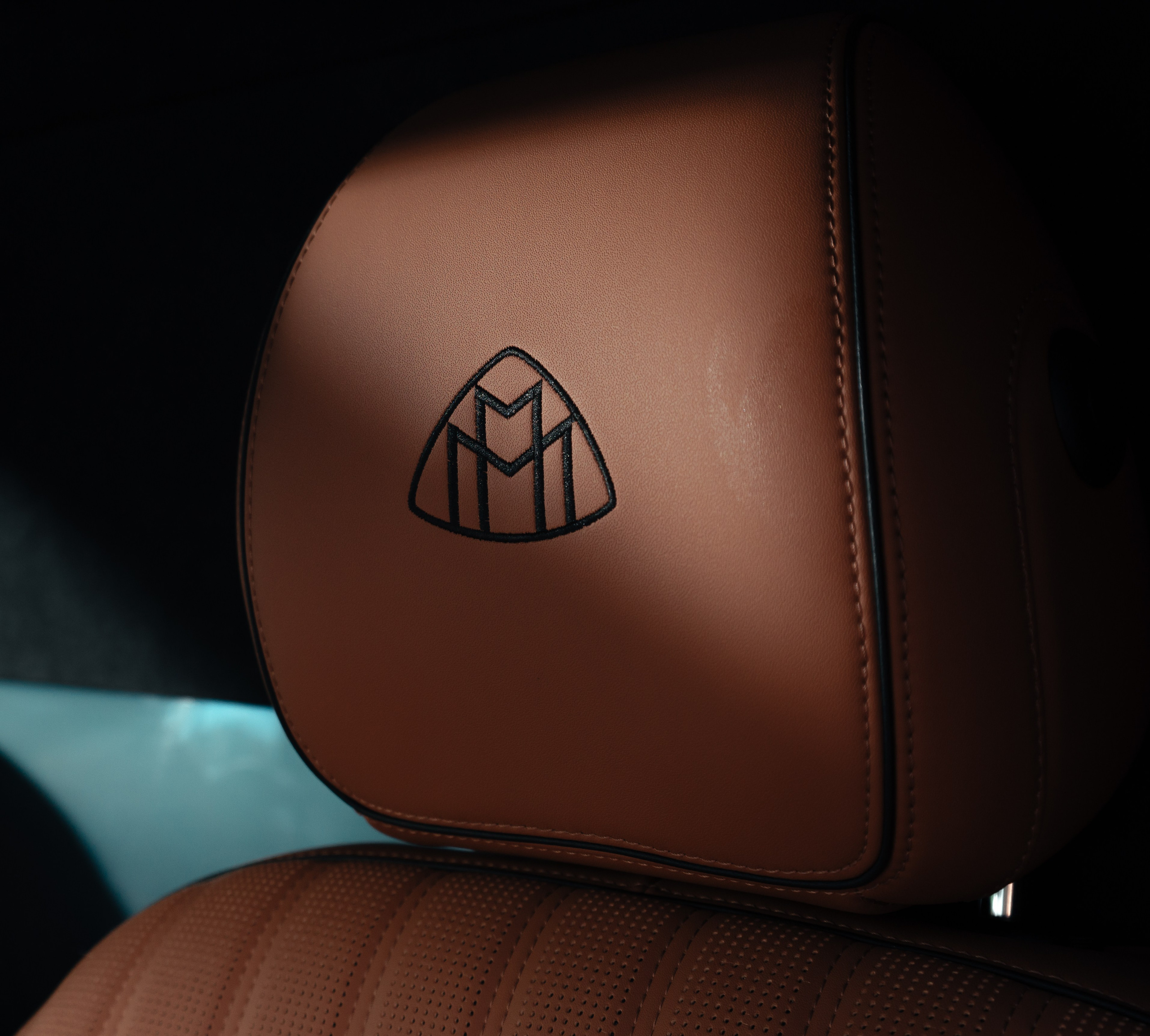 the seat of the mayboh cabin is brown leather