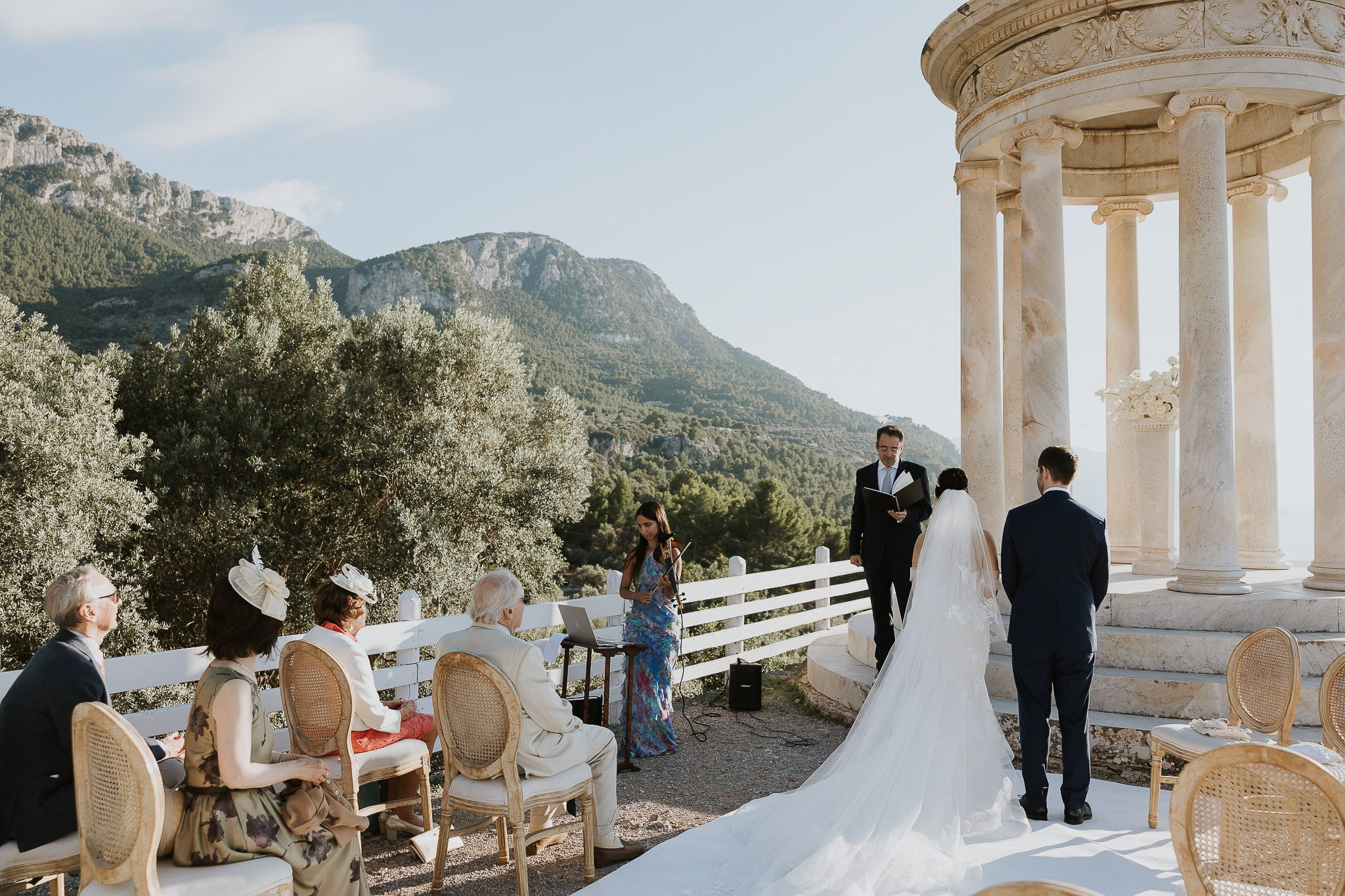 Officiant blessing bride and groom Son Marroig