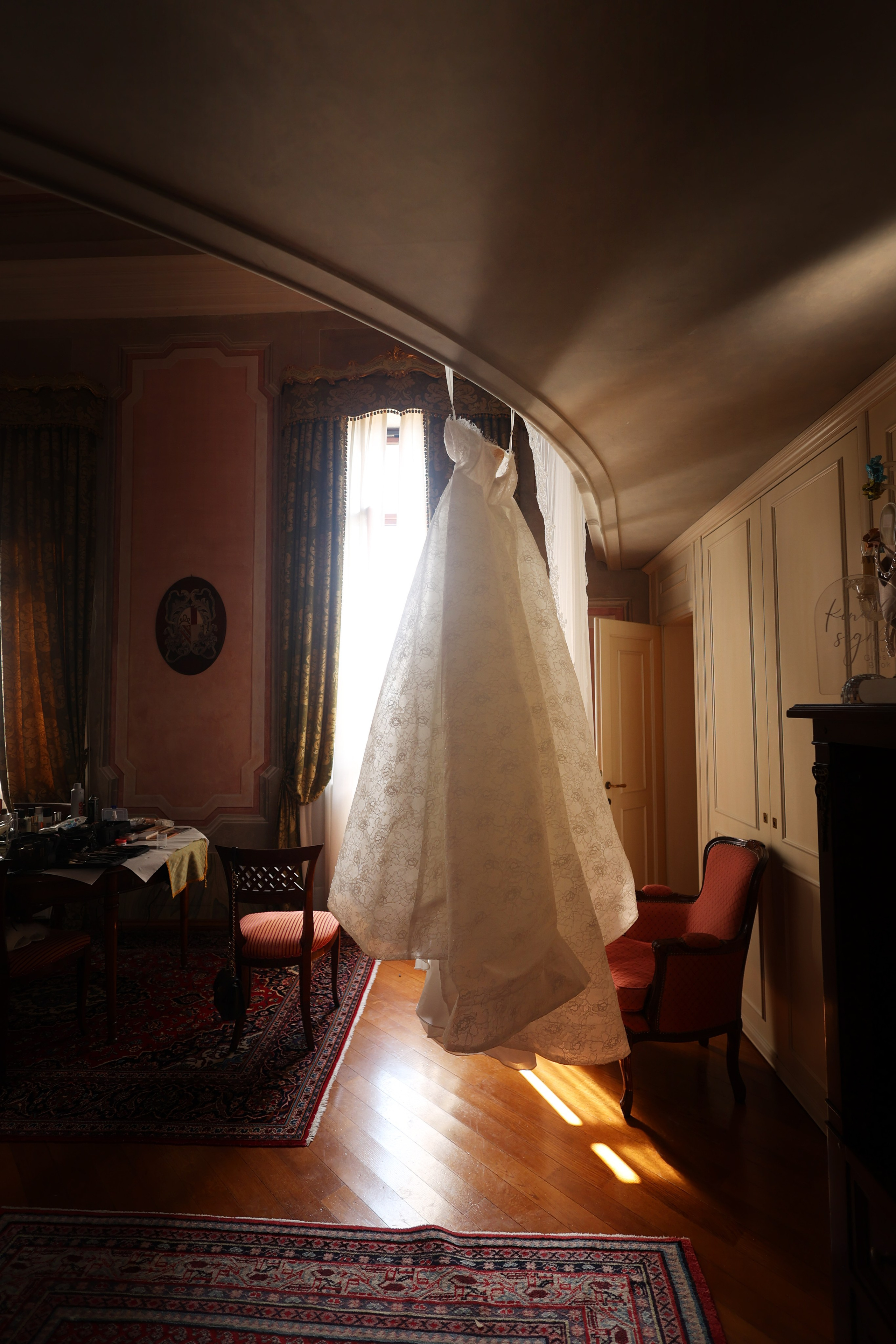 Close-up of wedding dress and accessories before the ceremony.