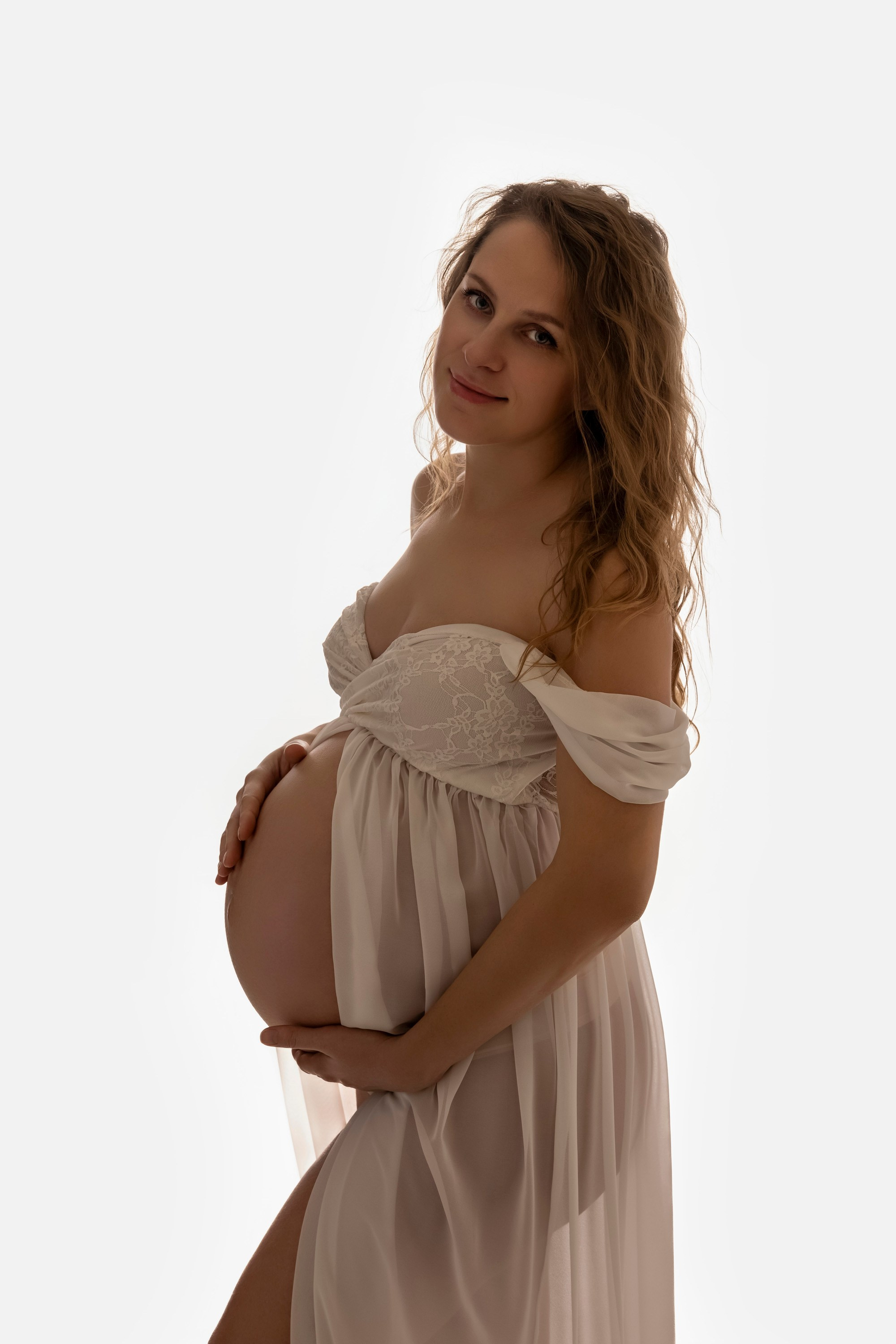 photoshoot with maternity closet, white see through dress