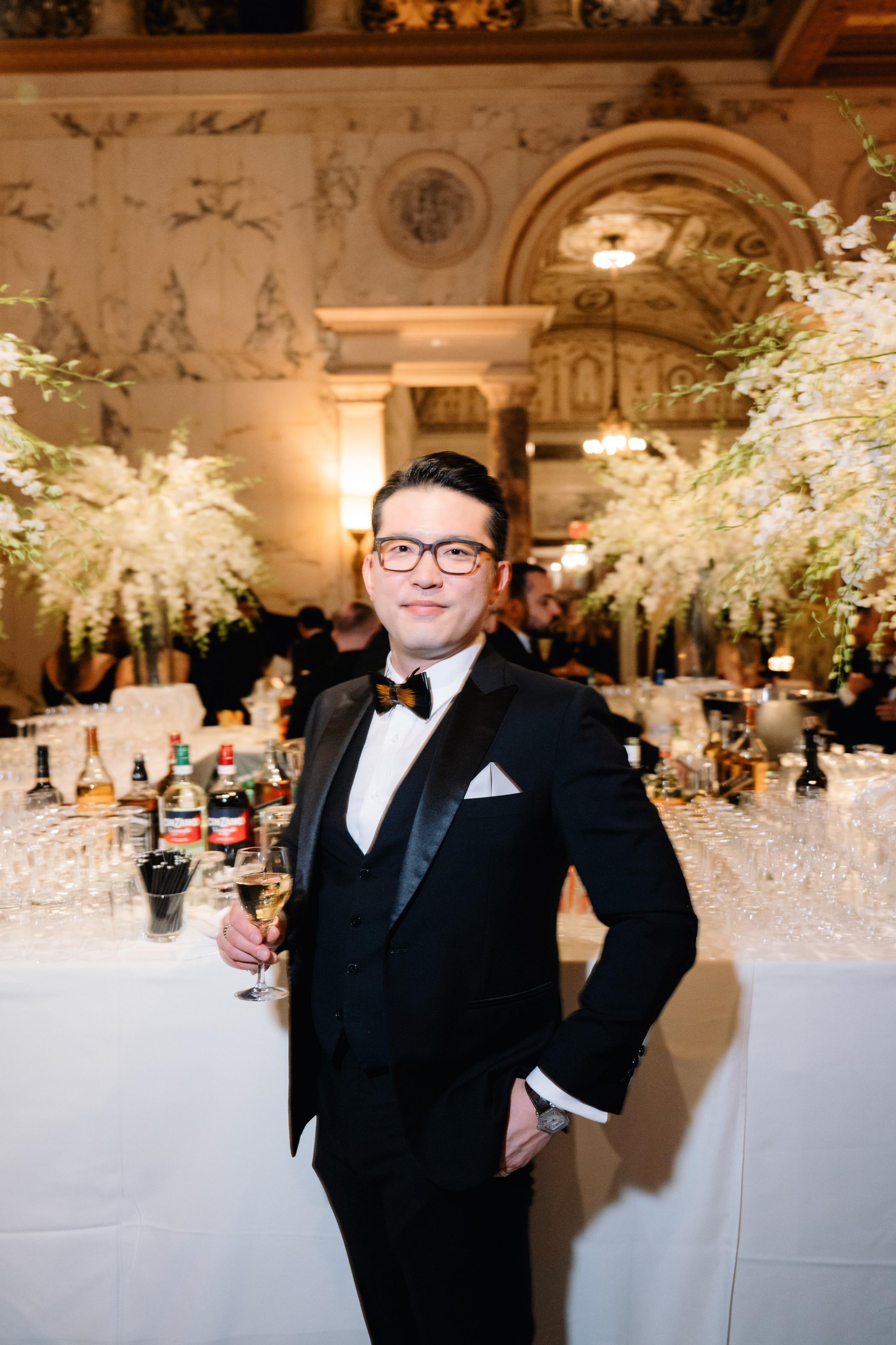 a man in a tuxed suit