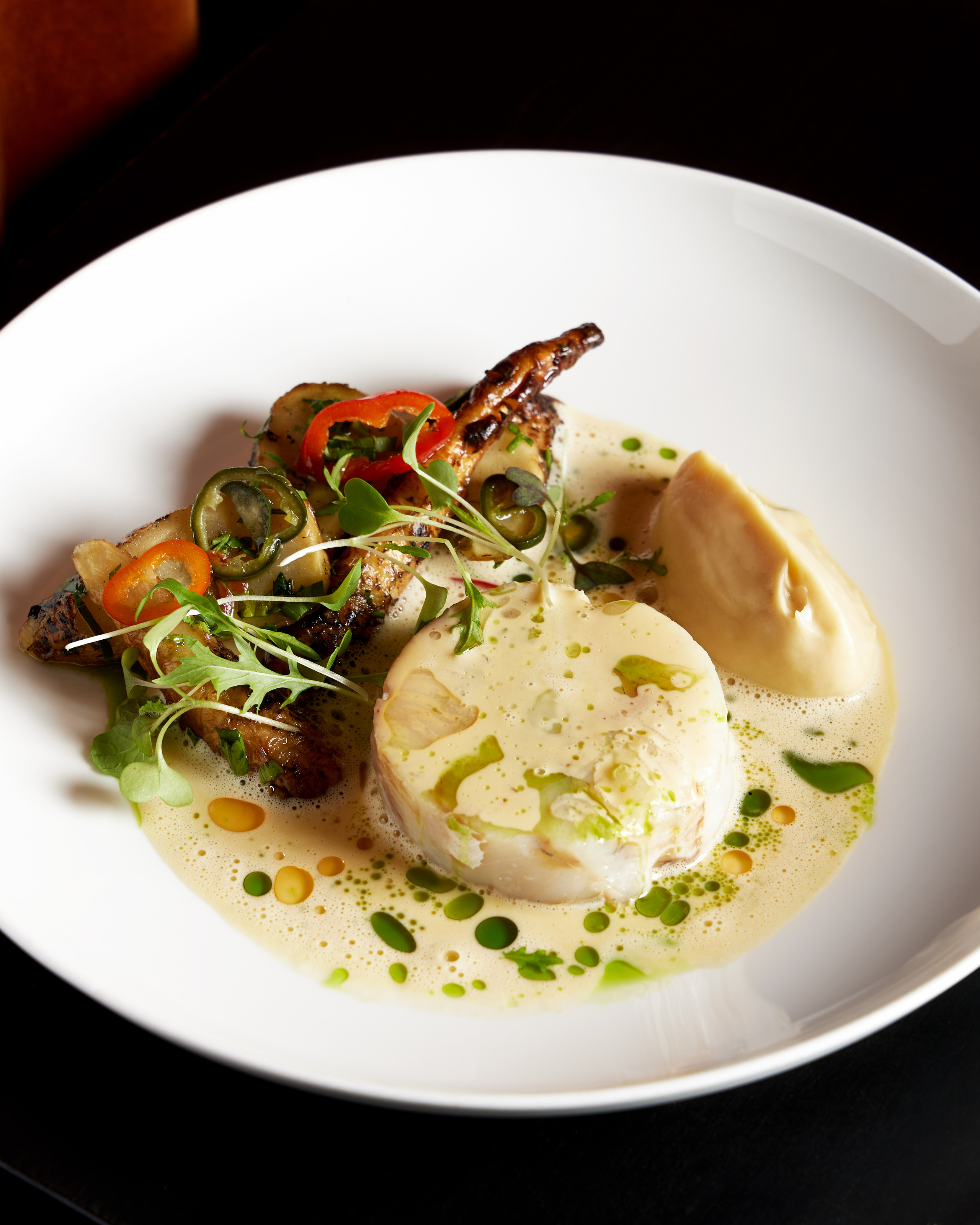 white fish with potato puree and roots