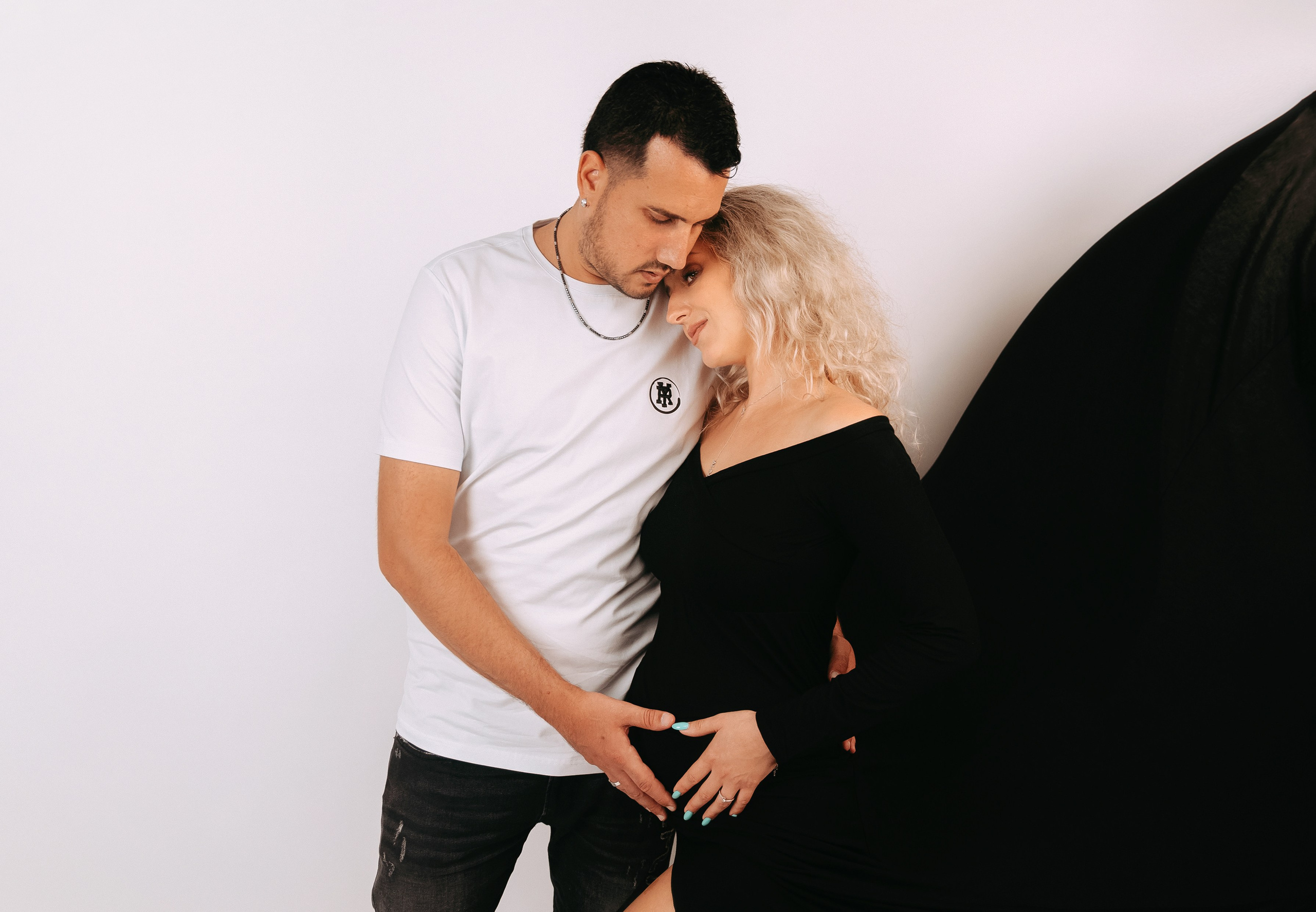 Studio pregnancy photoshooting for Alina and Michael. Home