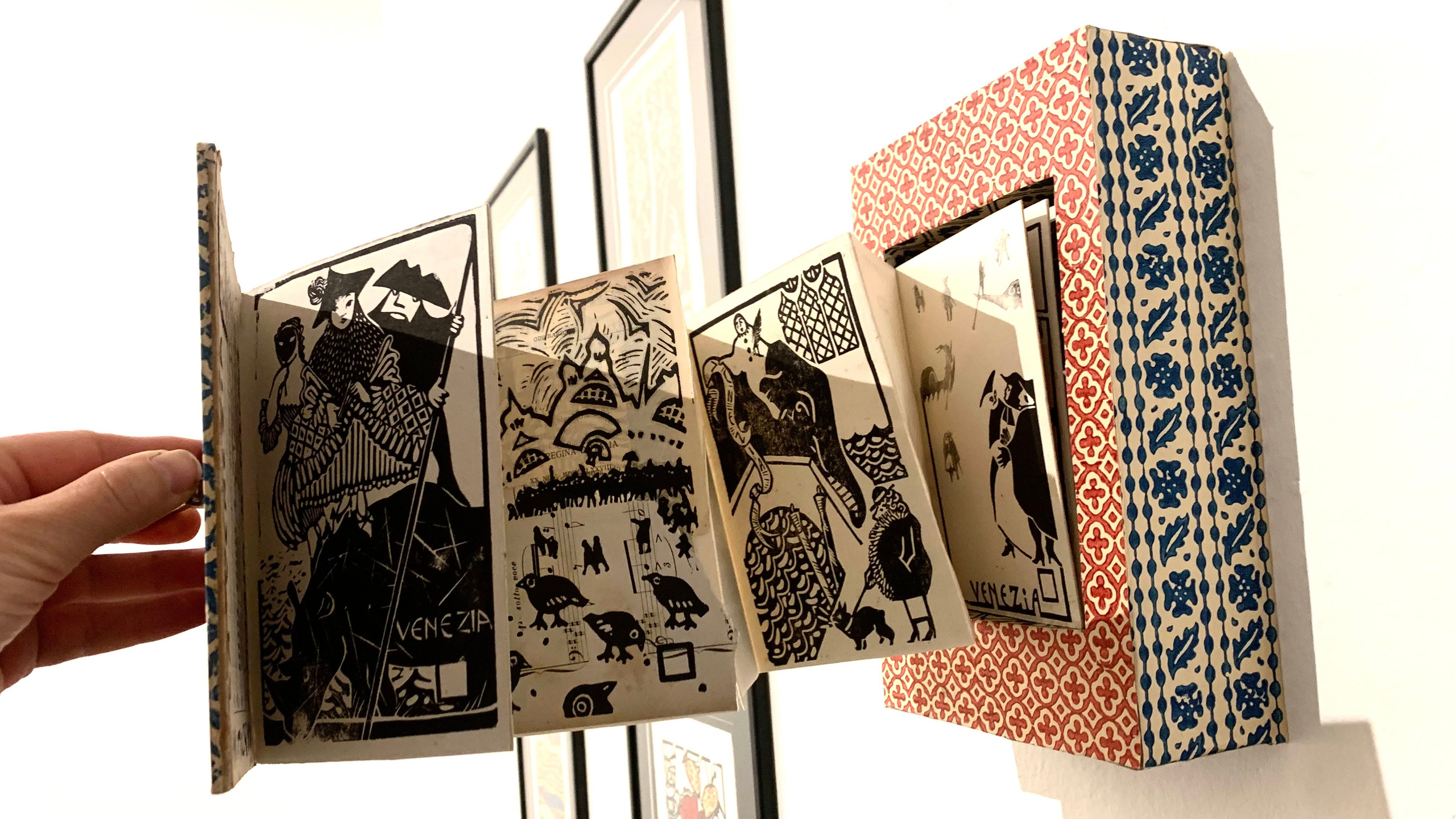 Artbook hanging on a wall