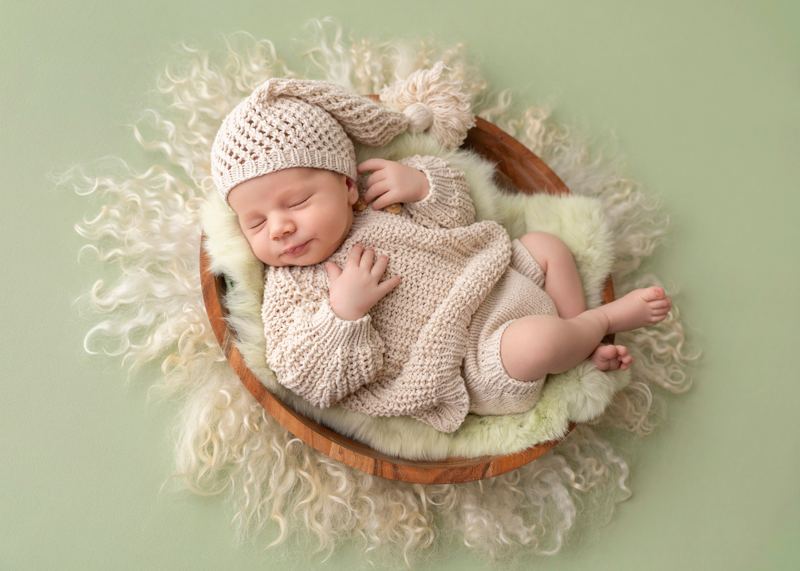 newborn photoshoot in natural colors, sage green