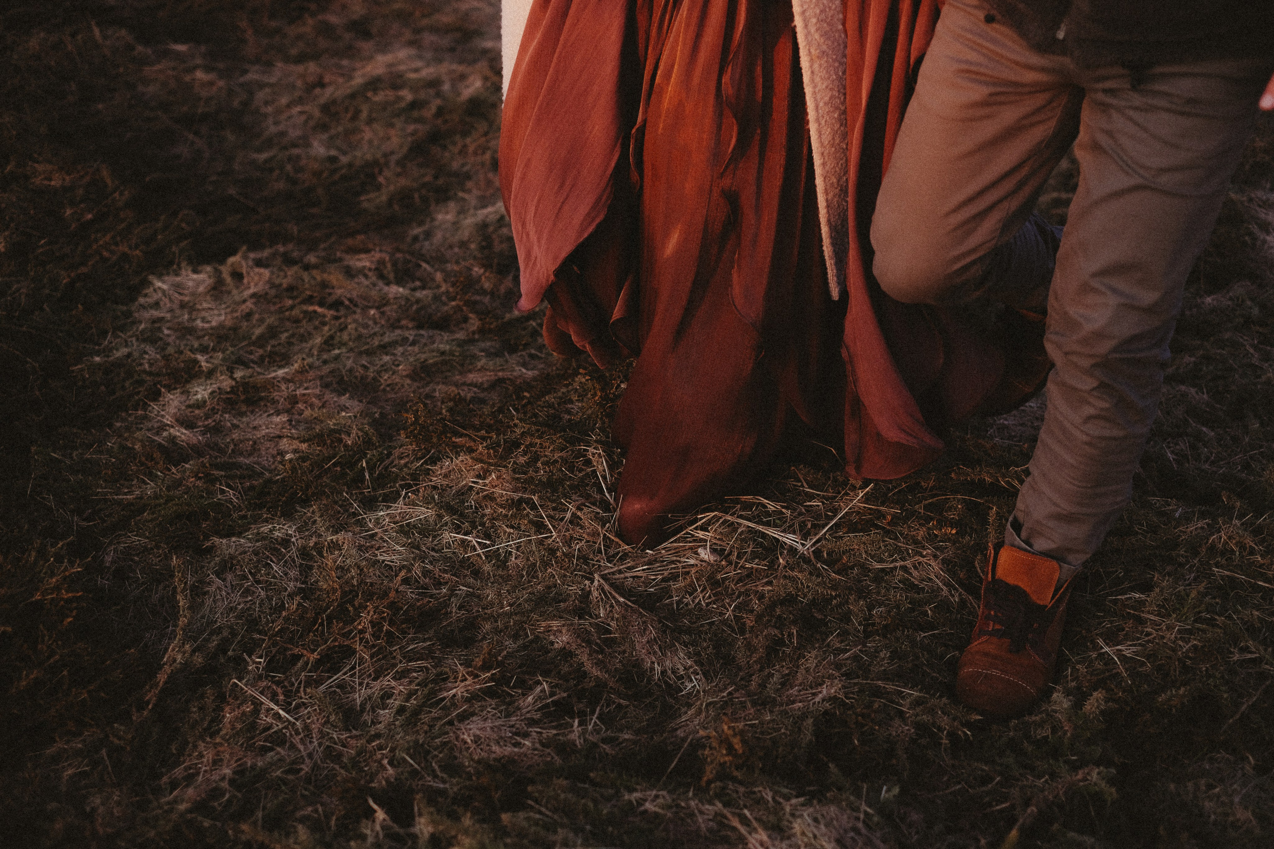 Couple walking through forest during engagement session in Portugal
