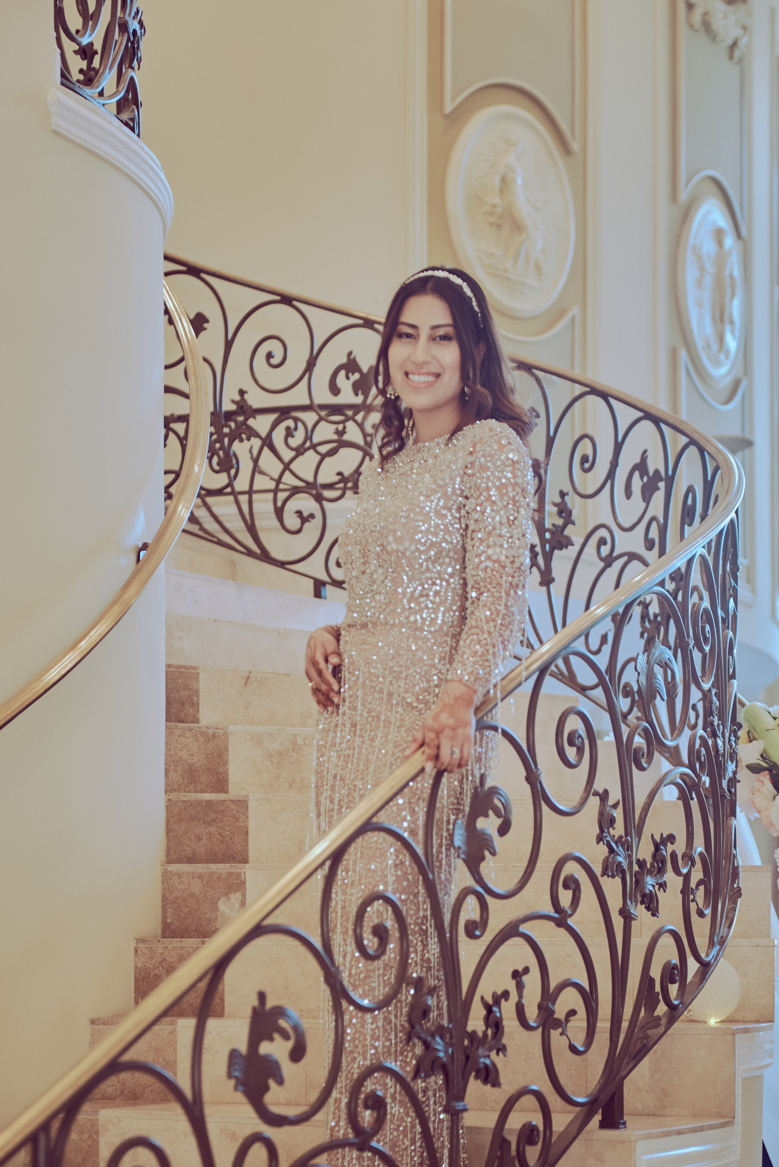 Elegant engagement portrait of a couple in a historic Los Angeles venue