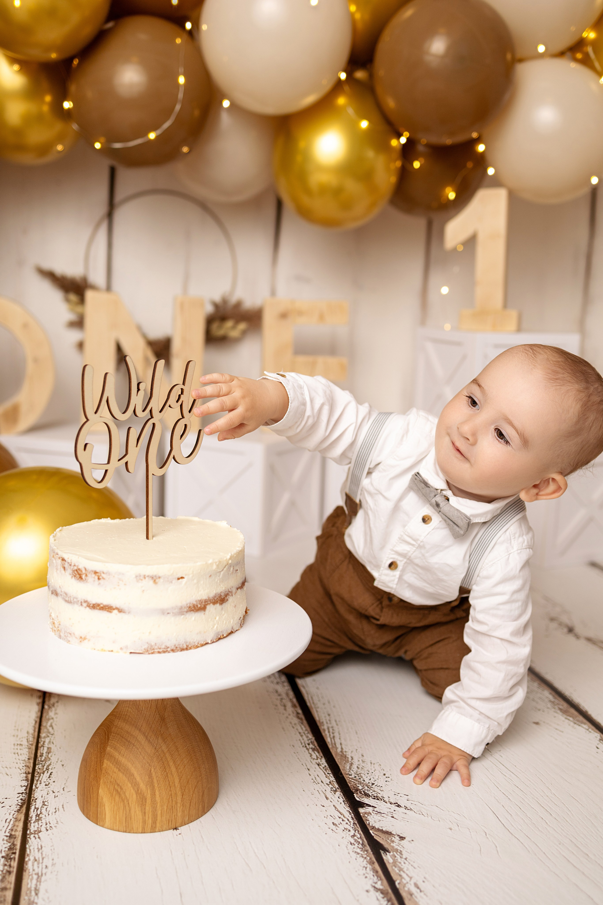 Erste Geburtstag „Cake Smash“. Neugeborene- Schwangerschaft- und Kinder Fotografin in Lehre