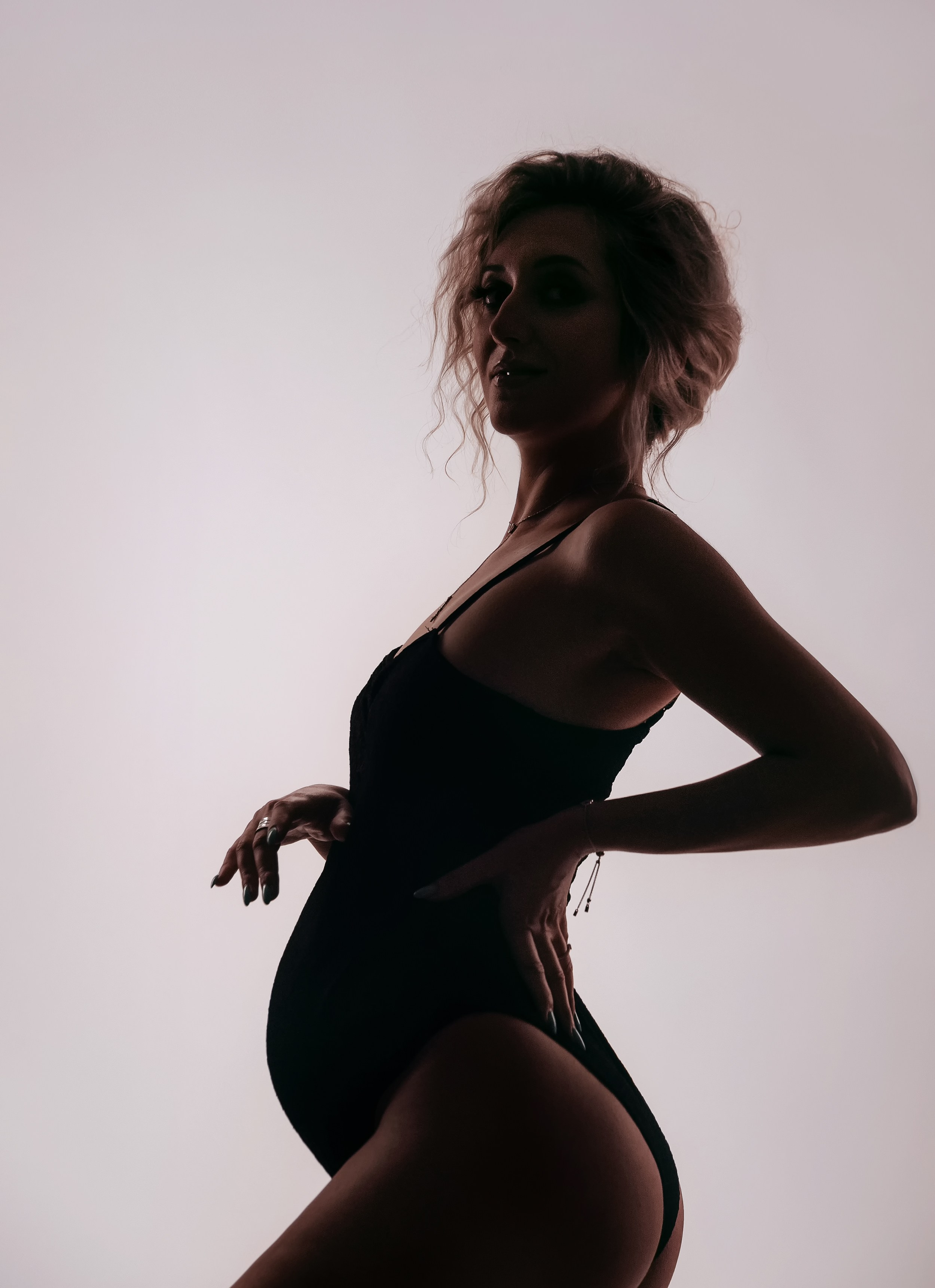 Studio pregnancy photoshooting for Alina and Michael. Home