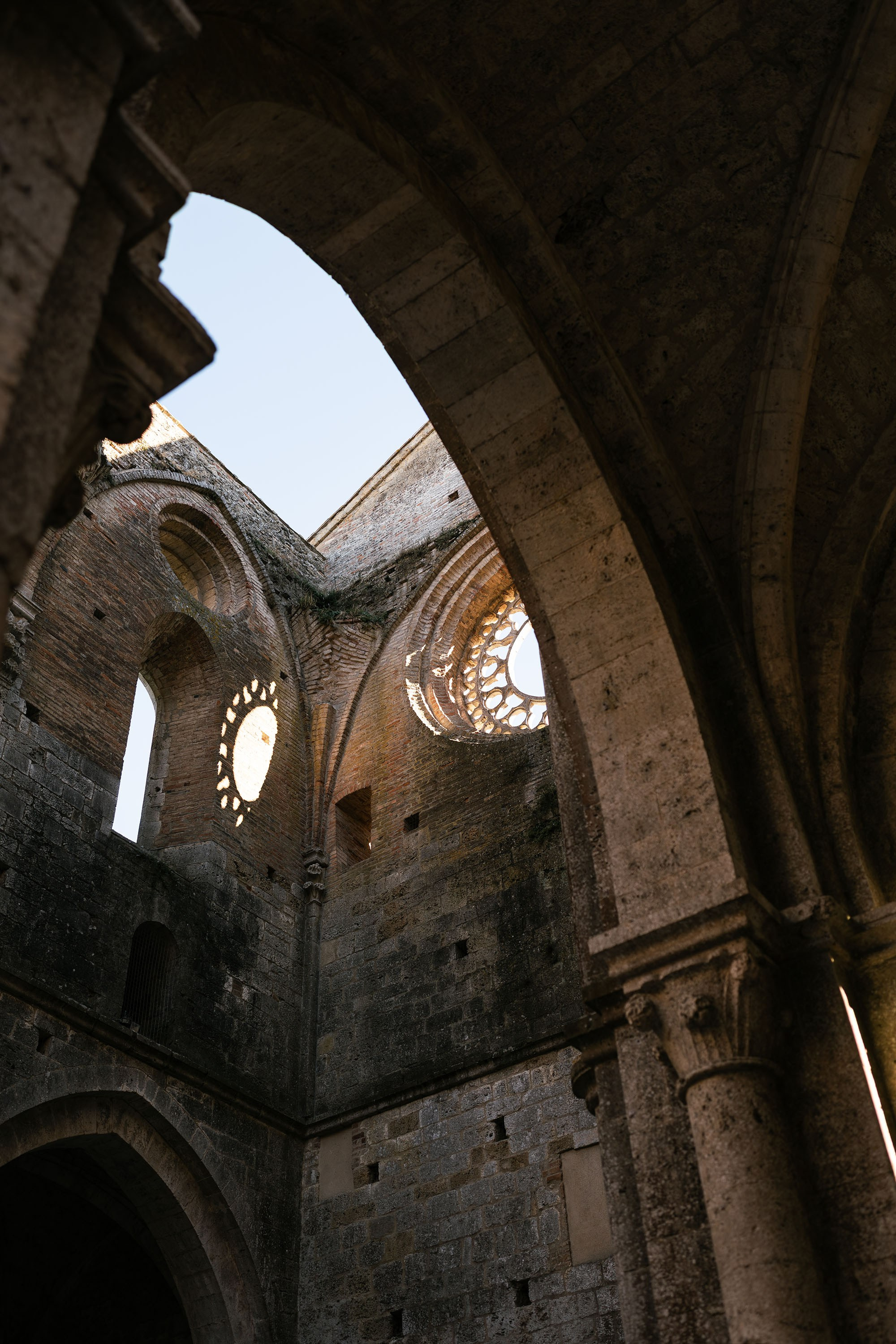 Ginevra and Avi — Abbazia di San Galgano, Tuscany. Destination Wedding Photographers and content creators based in Spain
