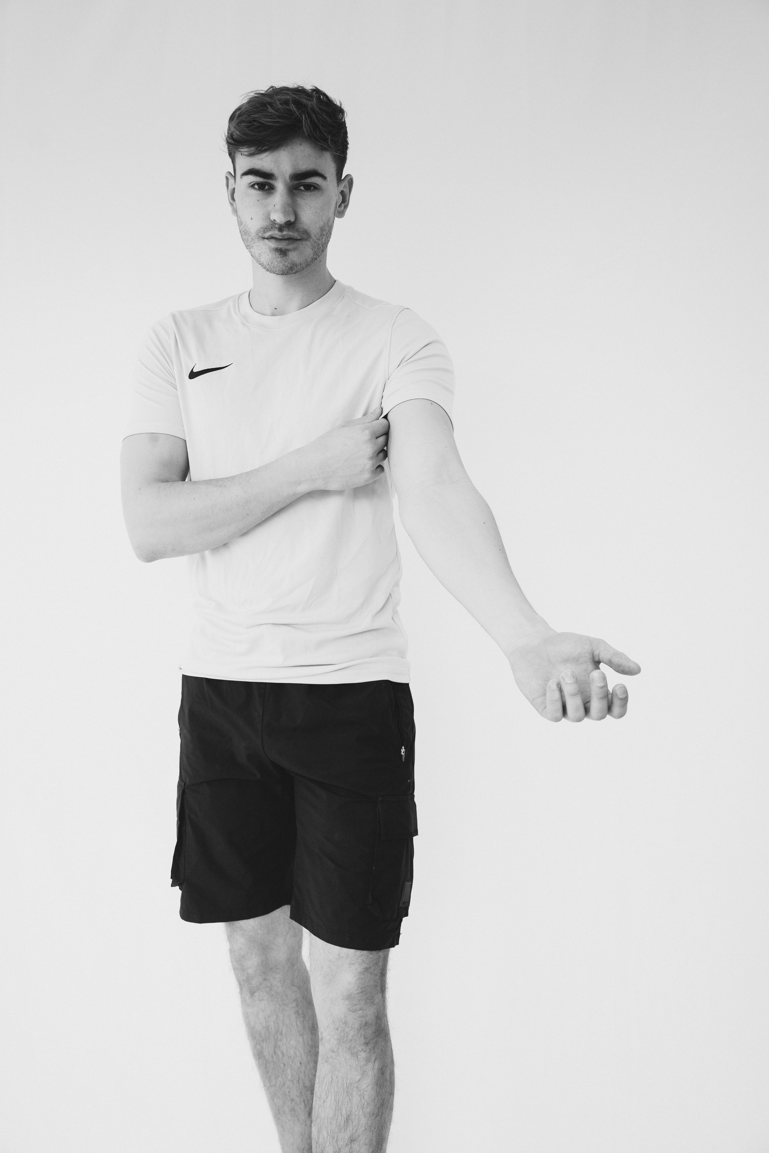 Standing male model in studio setup, ideal for commercial or editorial casting.