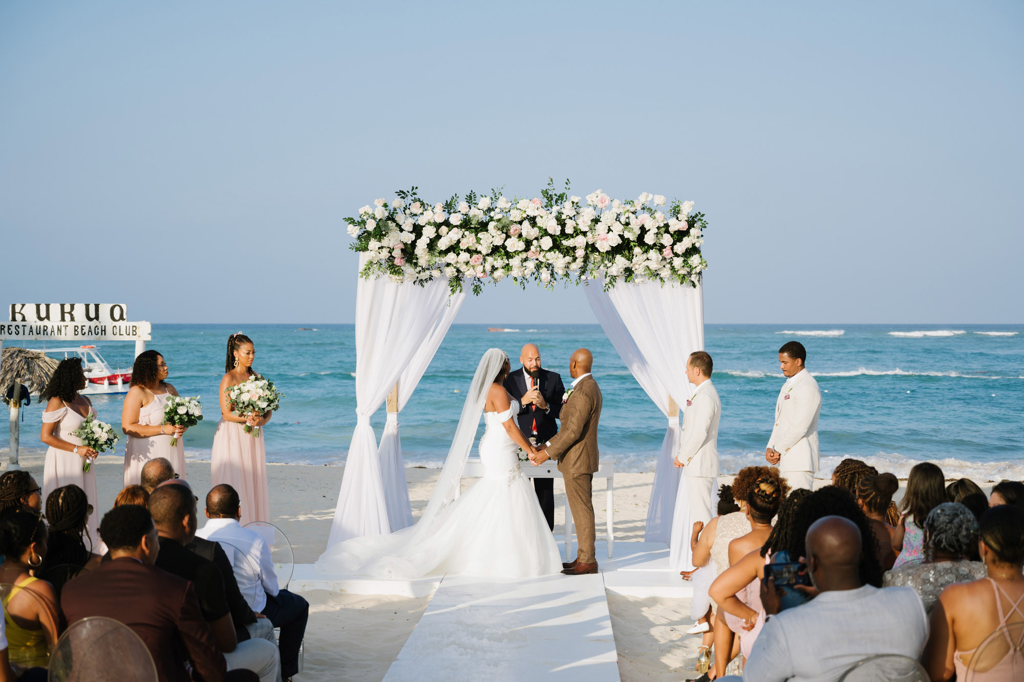 Lauren and Aaron's classic wedding at Kukua beach club