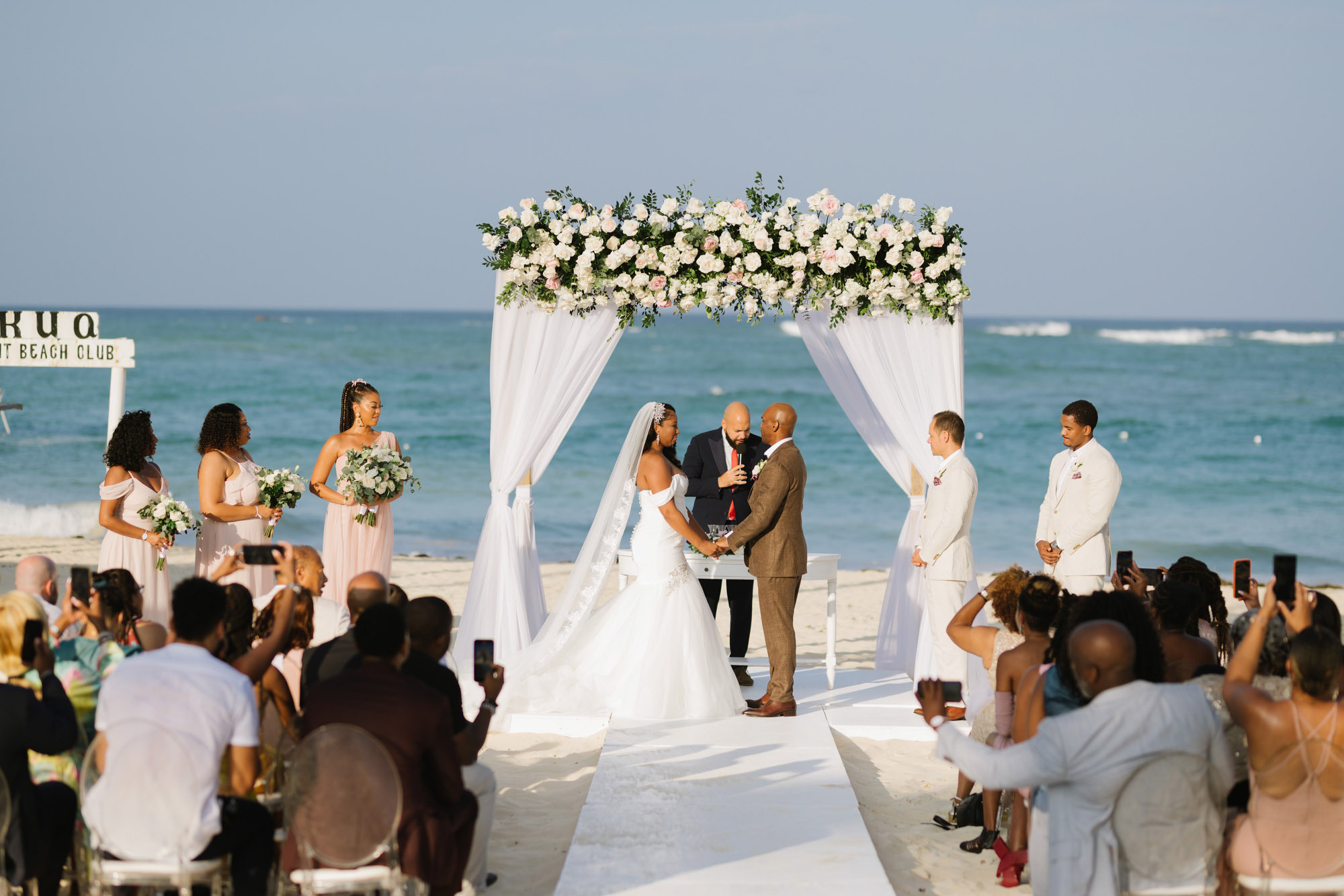 Lauren and Aaron's classic wedding at Kukua beach club