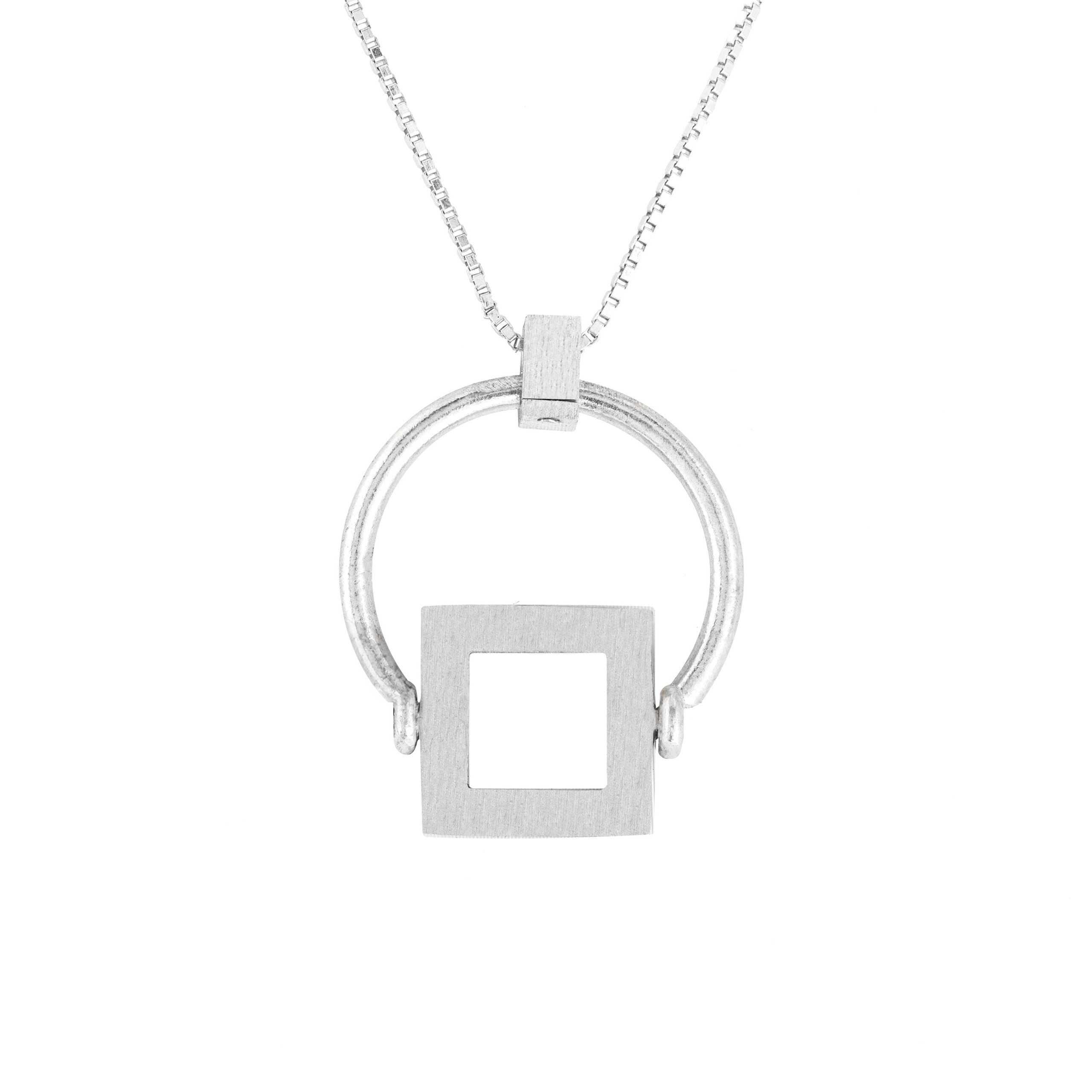 Minimalist photography of a luxury bracelet for a jewelry brand's promotional materials.