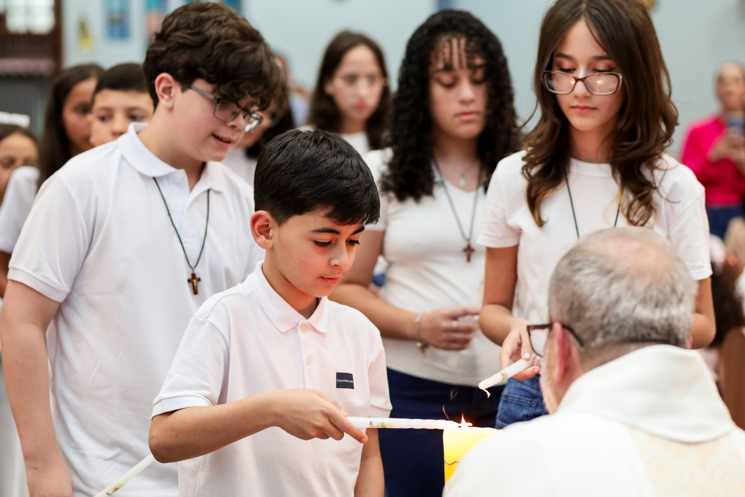 Primeira Eucaristia. Fotógrafo de momentos Sagrados