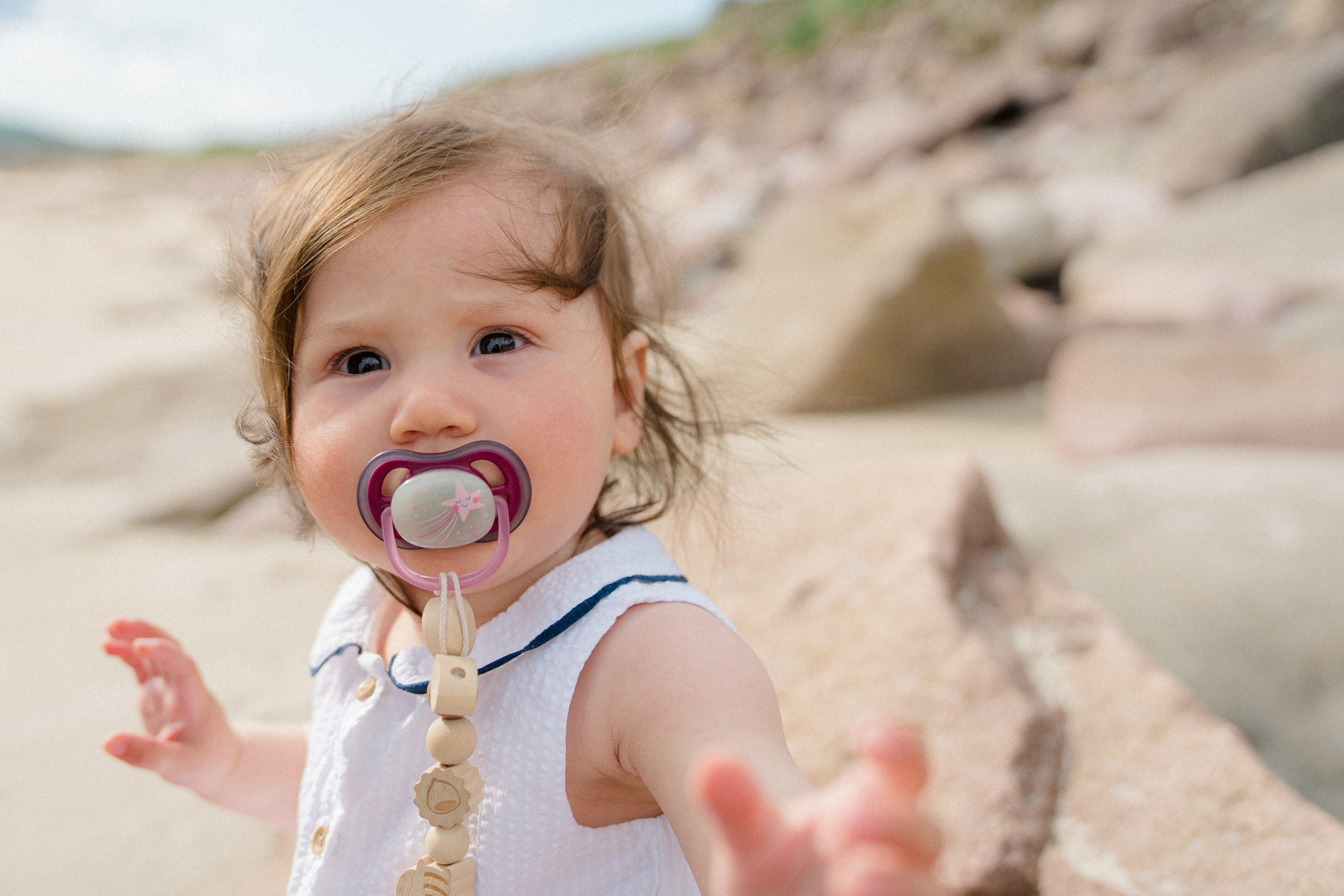 Darya and Mia at the ocean. Wedding and family photographer Ireland