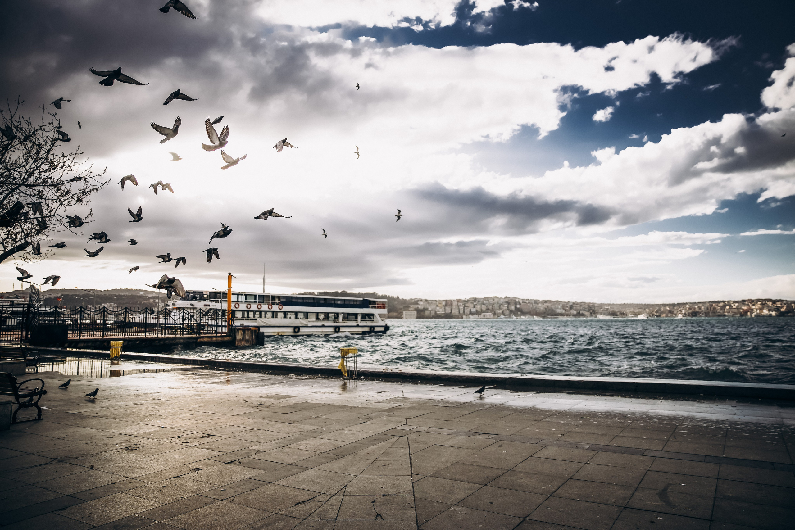 Bride and groom kissing near the Bosphorus – wedding photography Europe.