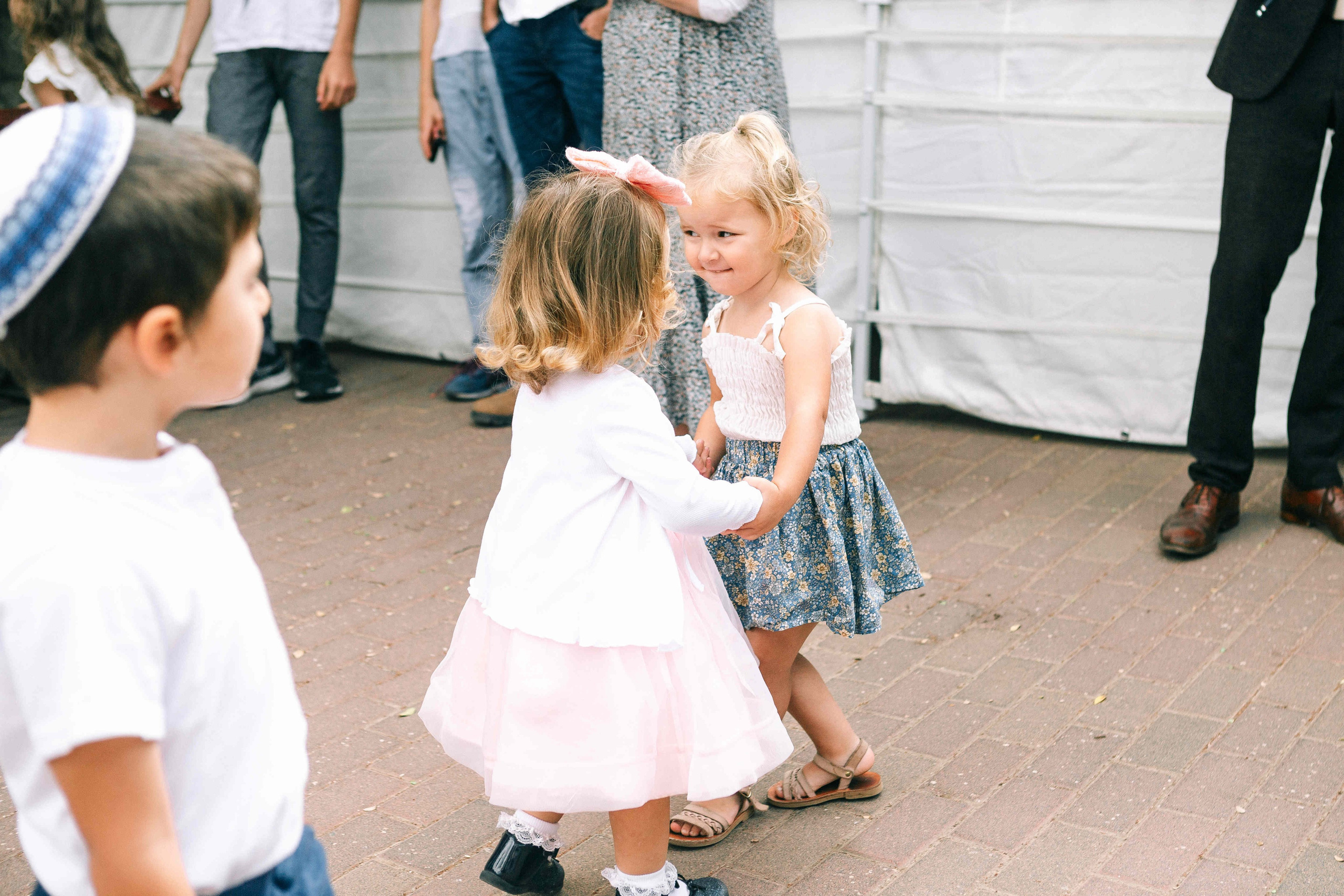 BRITH MILA IN THE SMALL SYNAGOGUE. PHOTOGRAPHER IN ISRAEL
