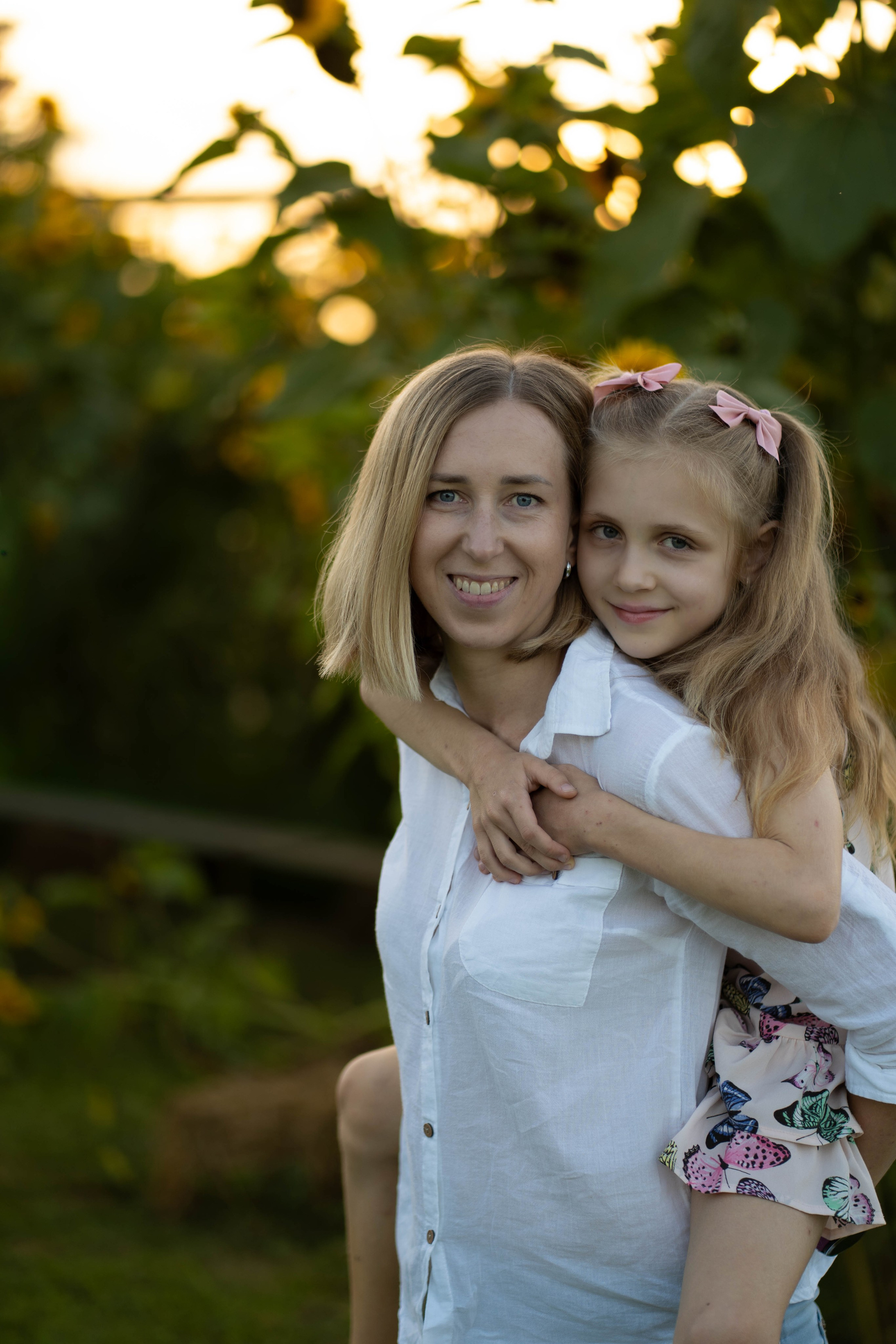Renata — šeimos fotosesija kukurūzų lauke. Fotografija — Olga Bojarin
