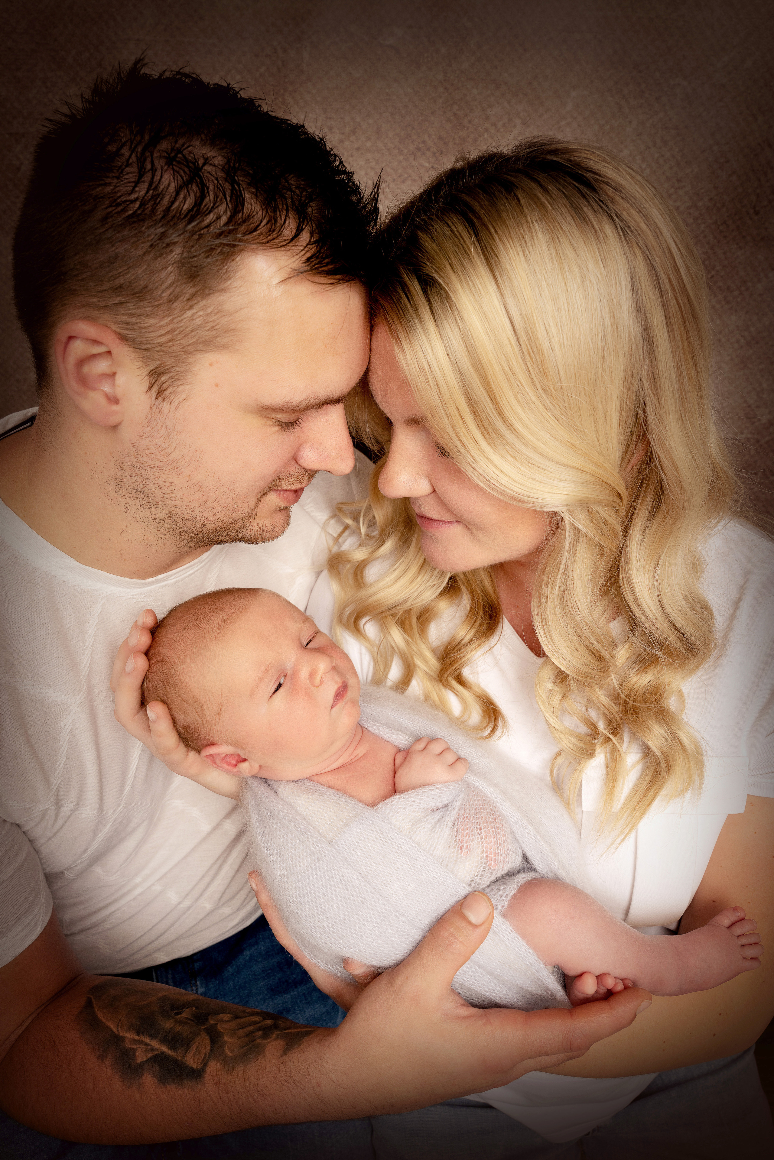 Eltern können nicht genug von dem Baby sehen