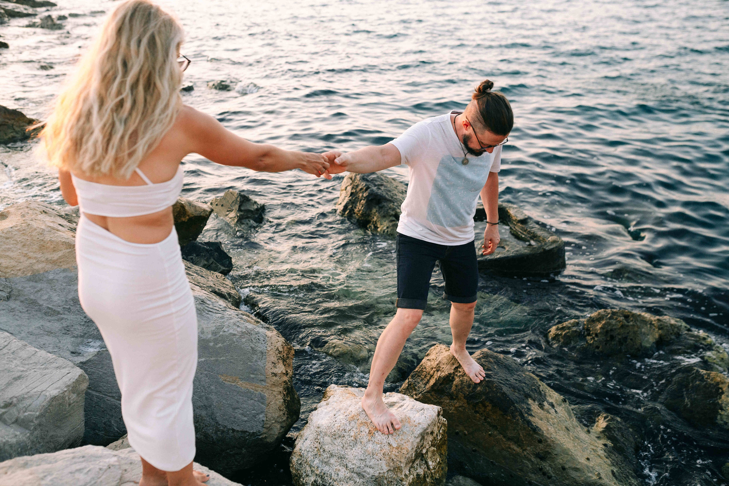 SUNSET IN JAFFO PORT. PHOTOGRAPHER IN ISRAEL