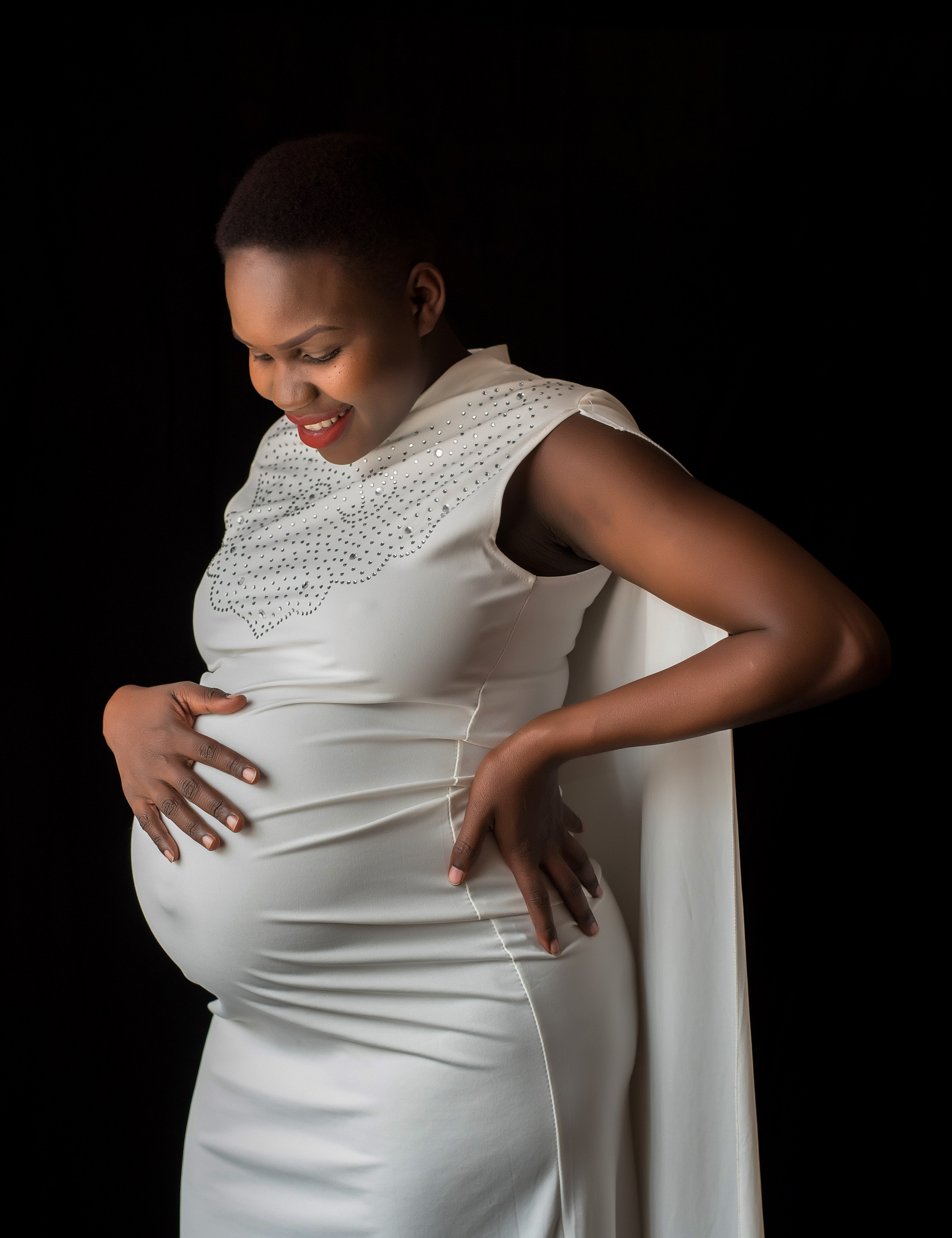 Candid maternity portrait of a pregnant woman 