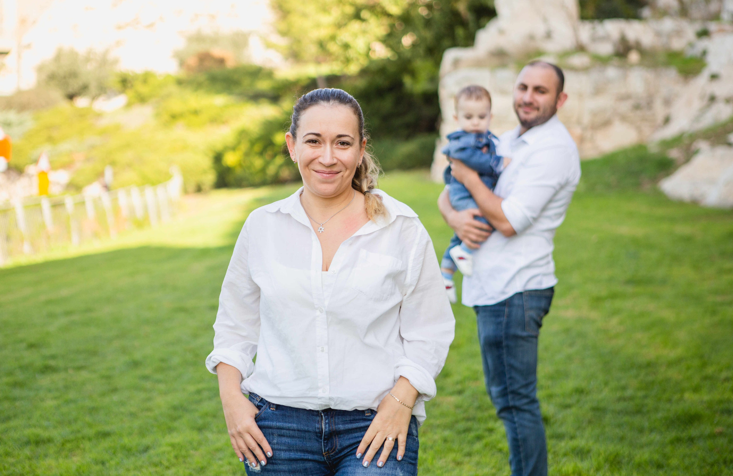 AT THE WALLS OF THE OLD CITY. PHOTOGRAPHER IN ISRAEL