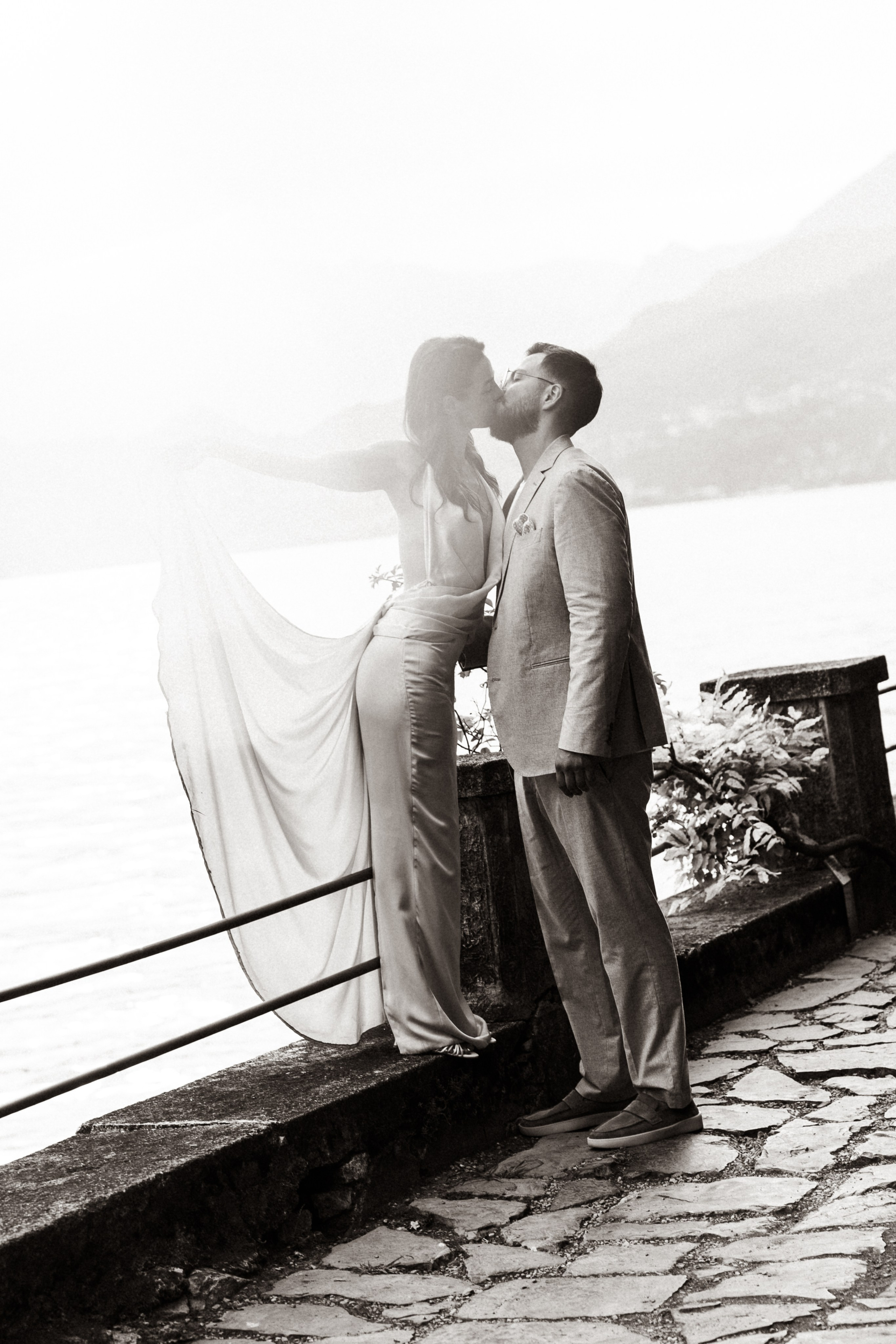 Couple walking together after a romantic marriage proposal in Italy, Lake Como