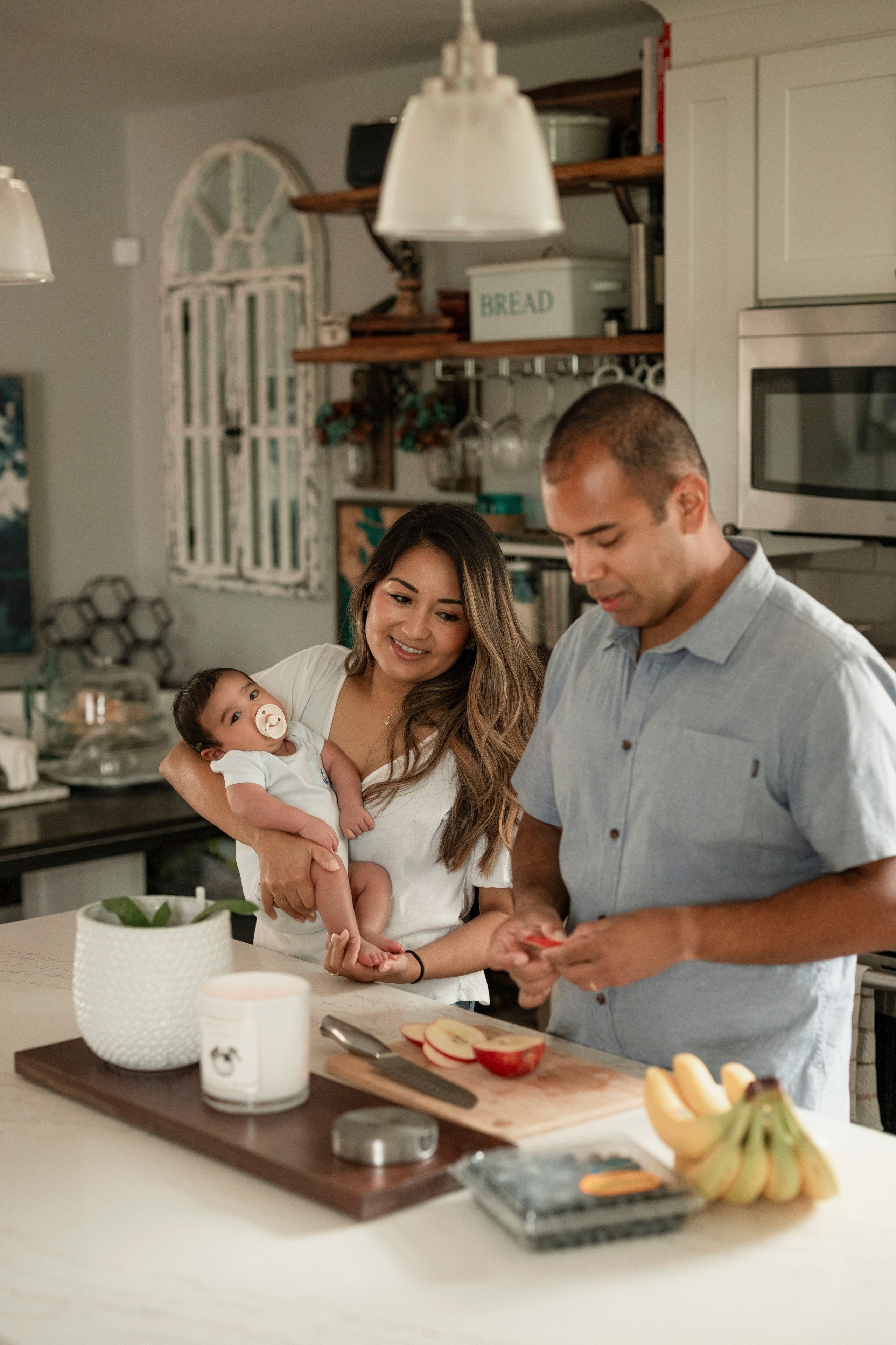 Natural candid moments of family with newborn baby
