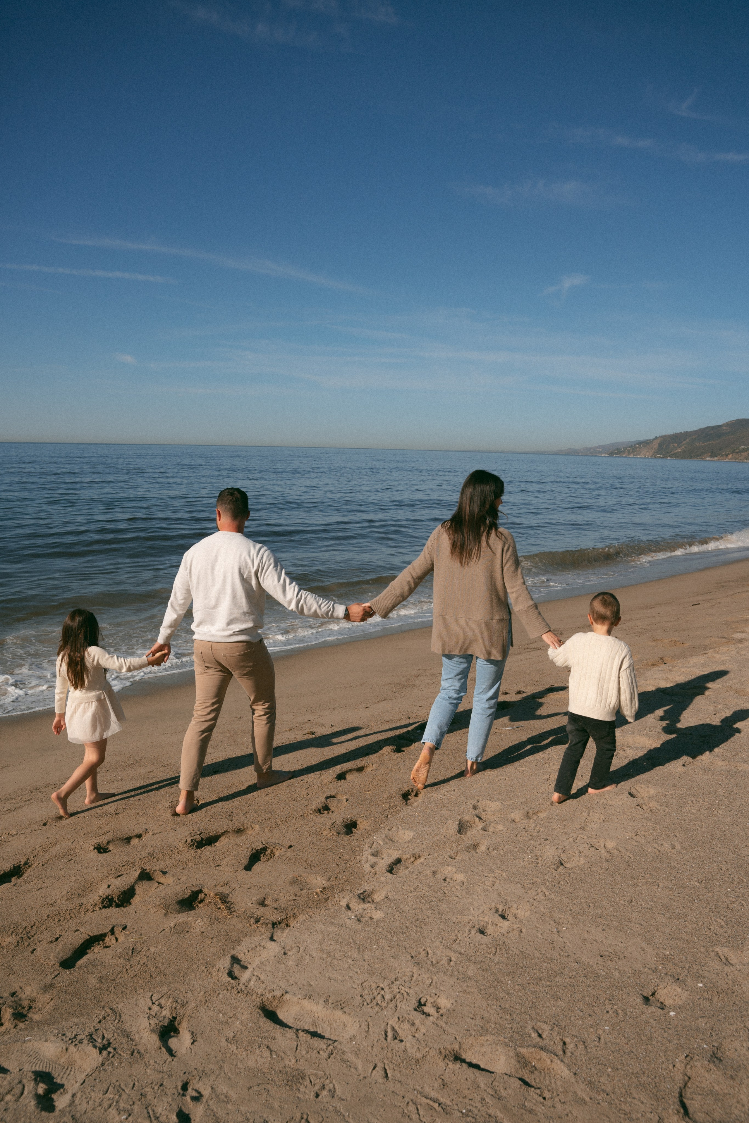 Family photoshoot. Family photoshoot outside. Beach photoshoot. Family holiday photoshoot. Sunset photoshoot