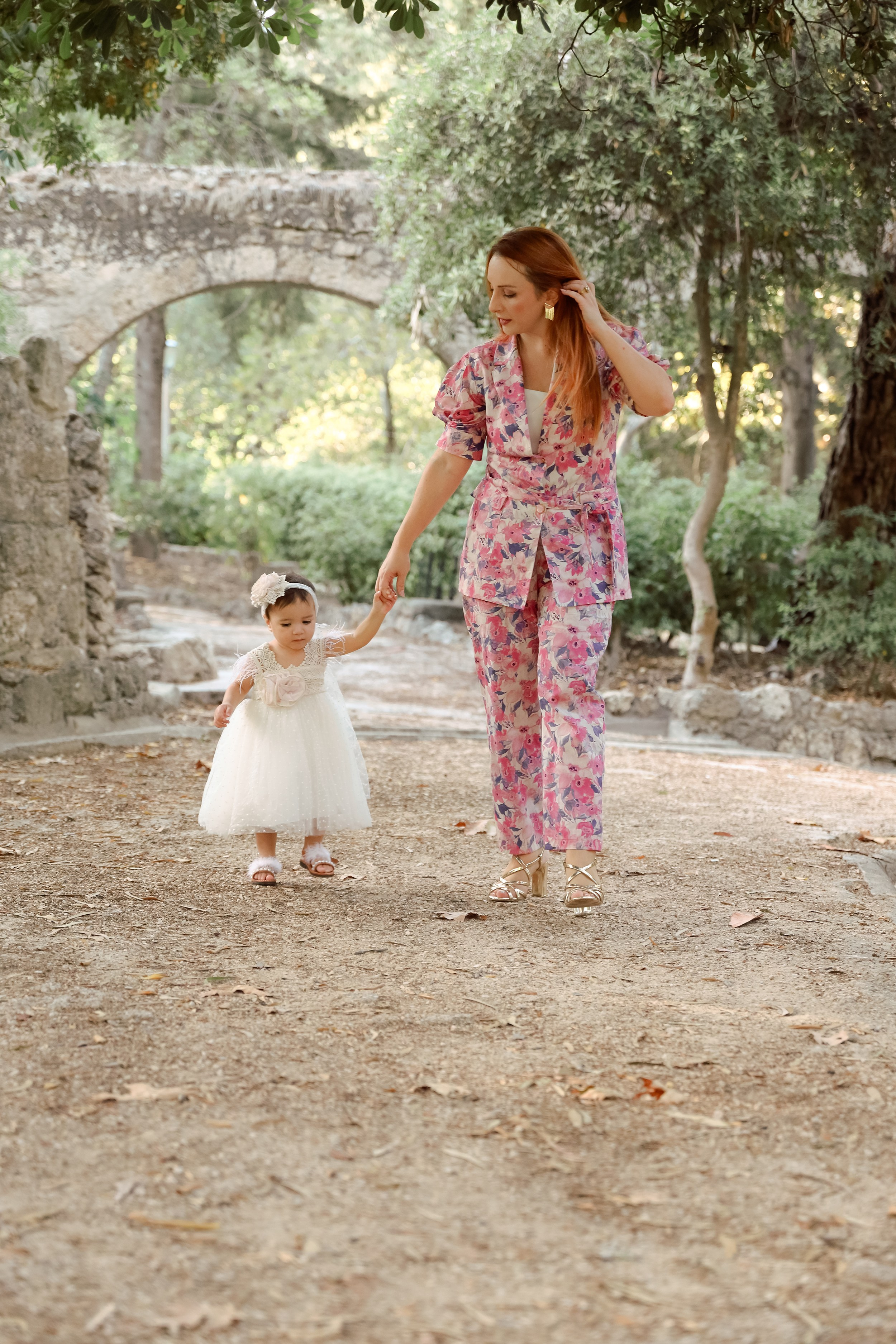 Mother is walking at the park with her daughter. Greece, Rhodes island