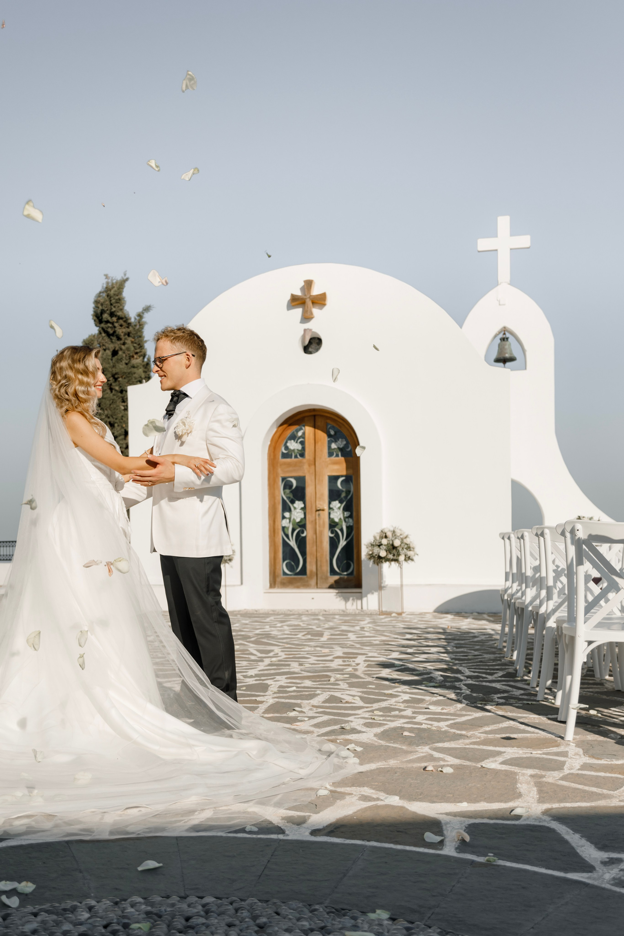 Bride an groom's portrait. Church Agia Sofia in luxury hotel Esperos Village. Rhodes Greece