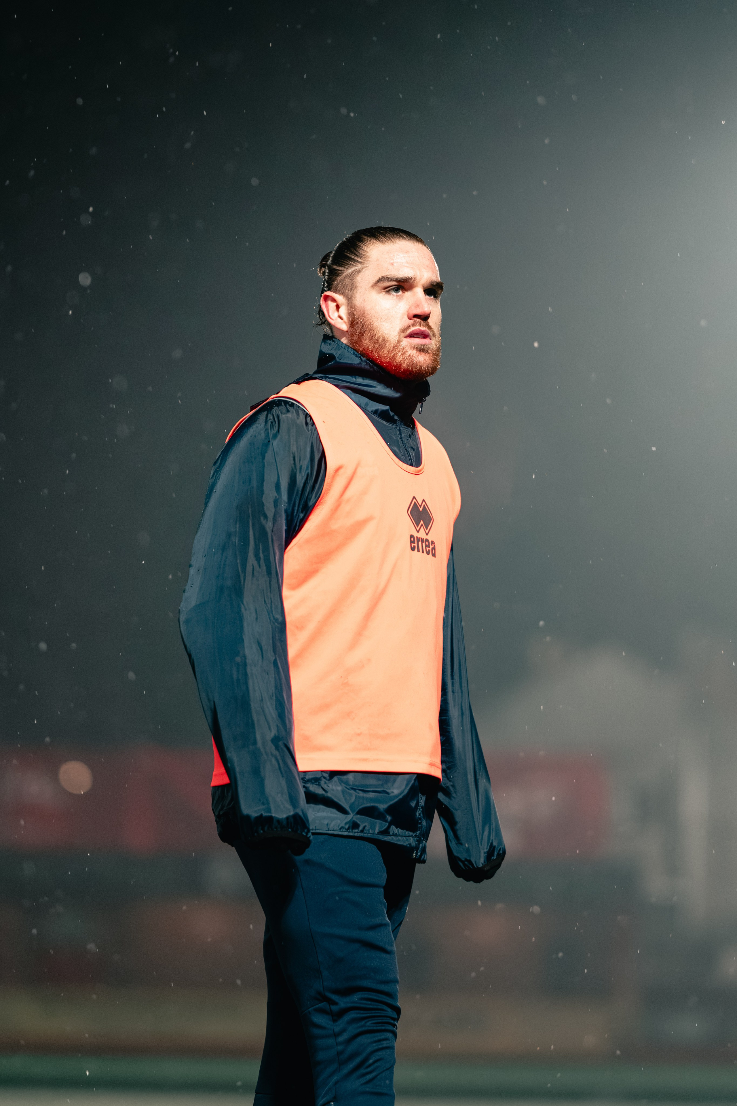 Tamworth forward Jordan Ponticelli warms up in an orange training bib during the Birmingham Senior Cup match vs Alvechurch at The Lamb Ground, Tamworth (03 Feb 2026)