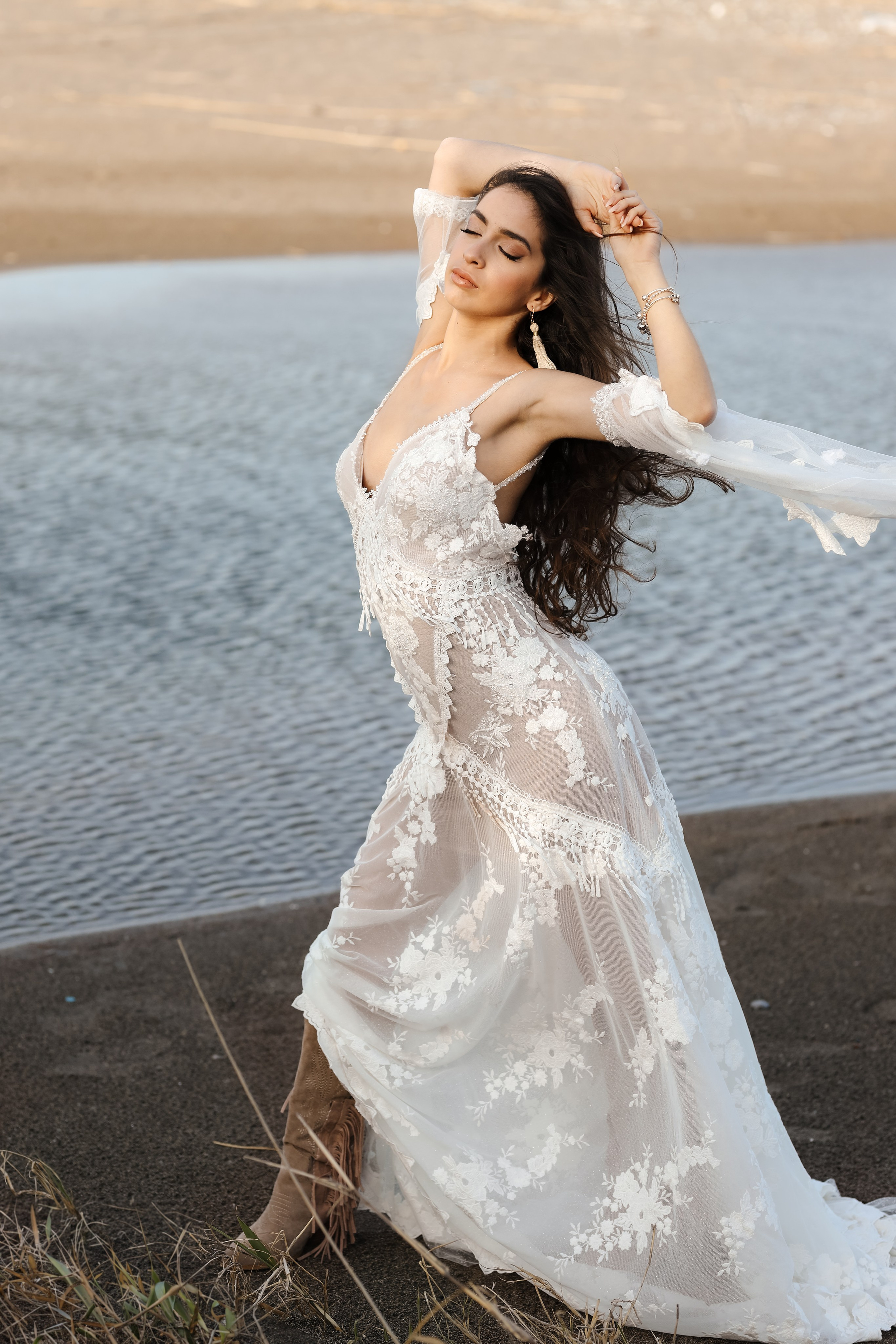 A portrait of girl in a wedding dress next to the sea. Rhodes, Greece