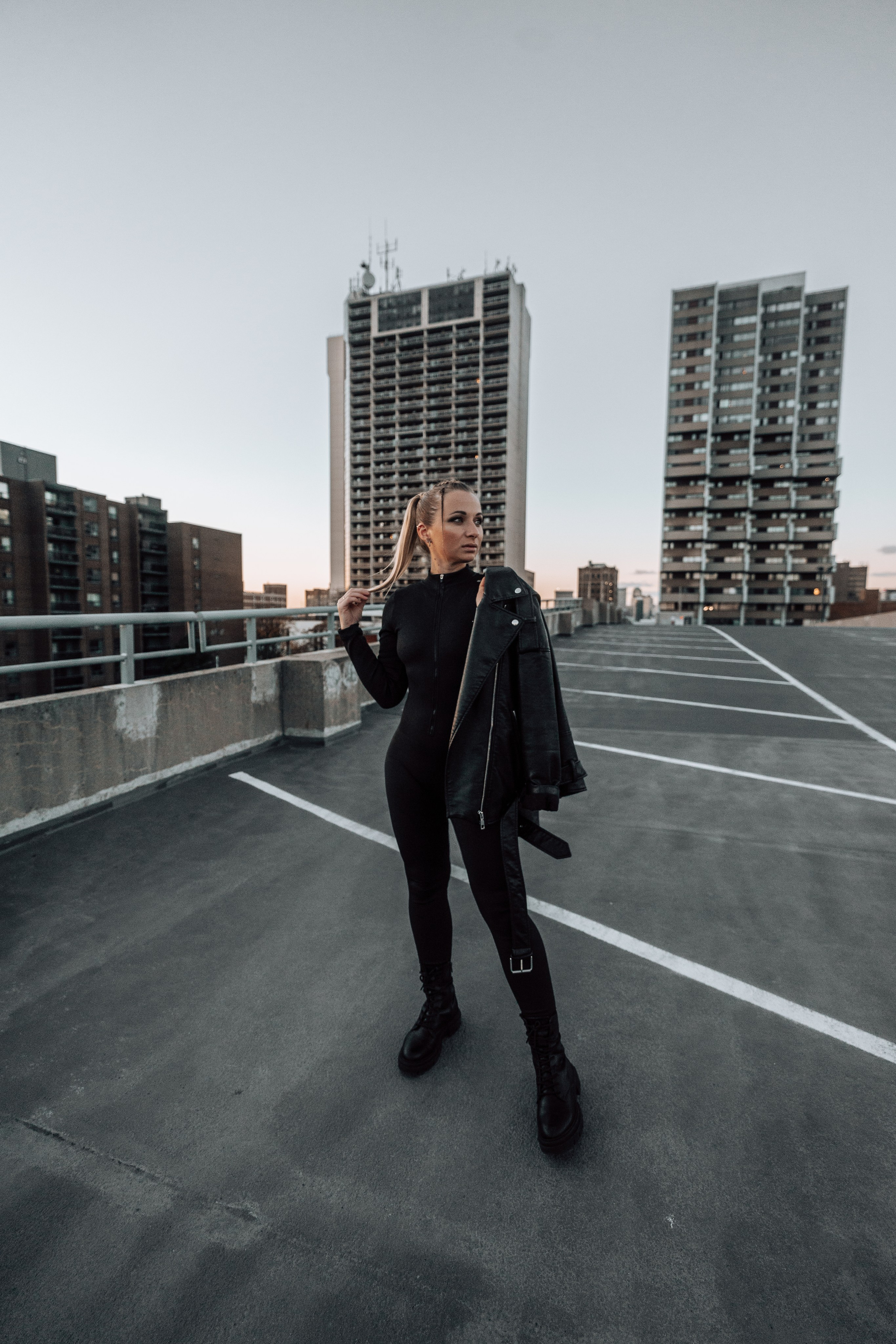 Individual photoshoot on a Windsor rooftop, blending creative angles and natural light for a striking portrait.