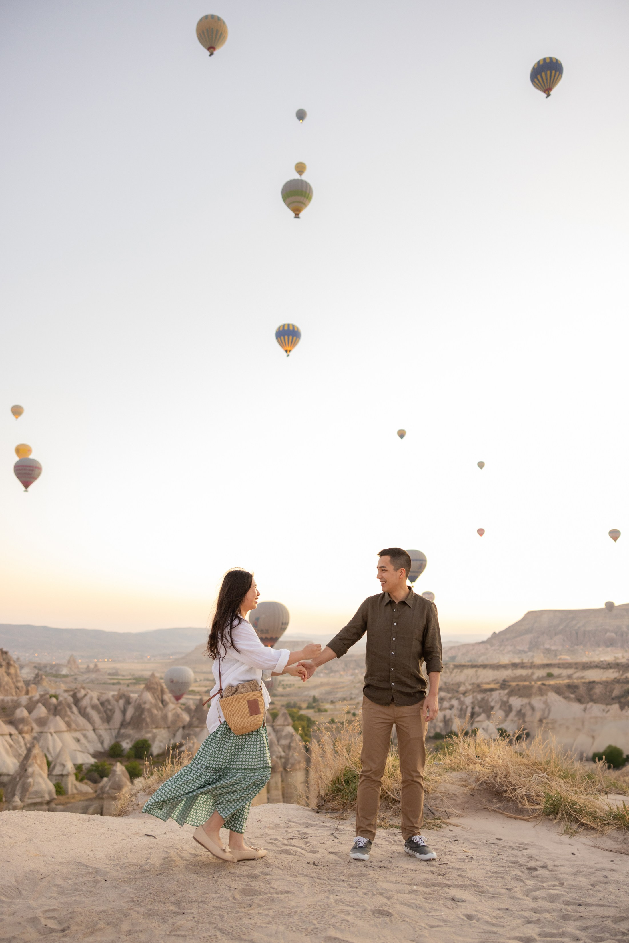 Romantic Love Story Photoshoot with Hot Air Balloons in Cappadocia. Julia Ganch I Fashion Wedding Photography I Cappadocia Turkey