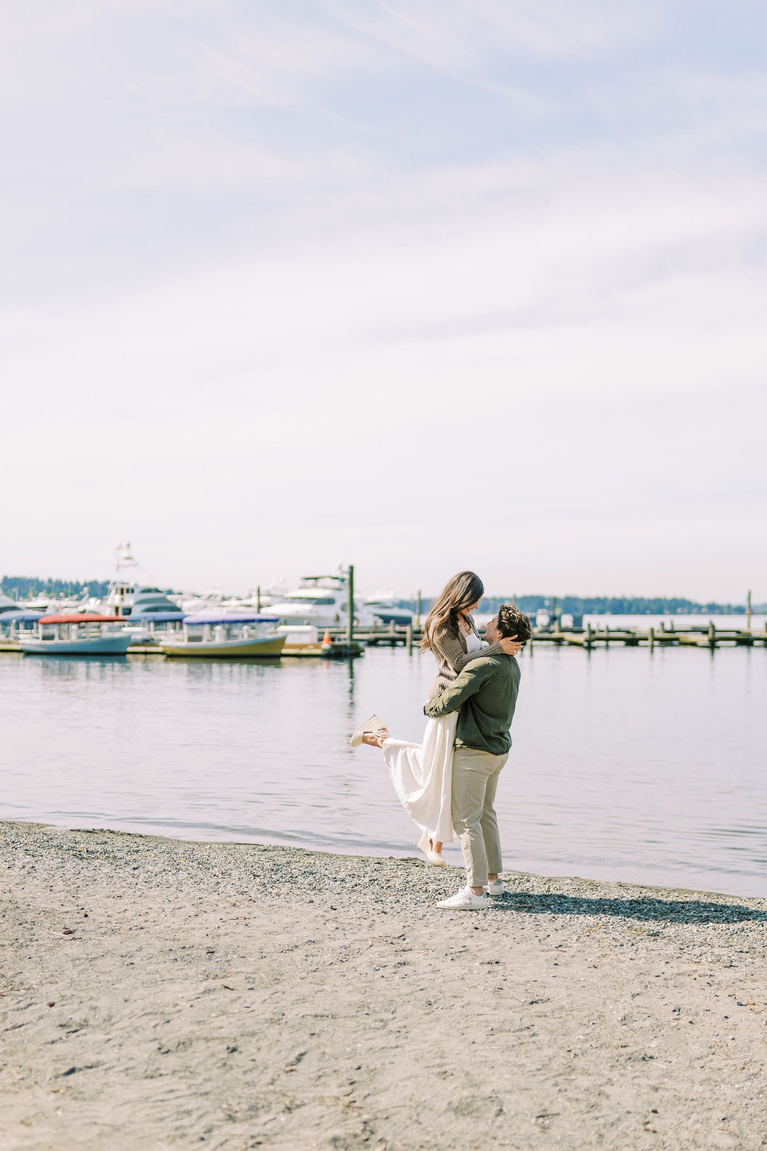 Engagement photo shoot Jake & Caroline / May 2024. Marina Park|Kirkland, WA. EVAN ARISTOV WEDDING PHOTOGRAPHY — Seattle Wedding Photographer